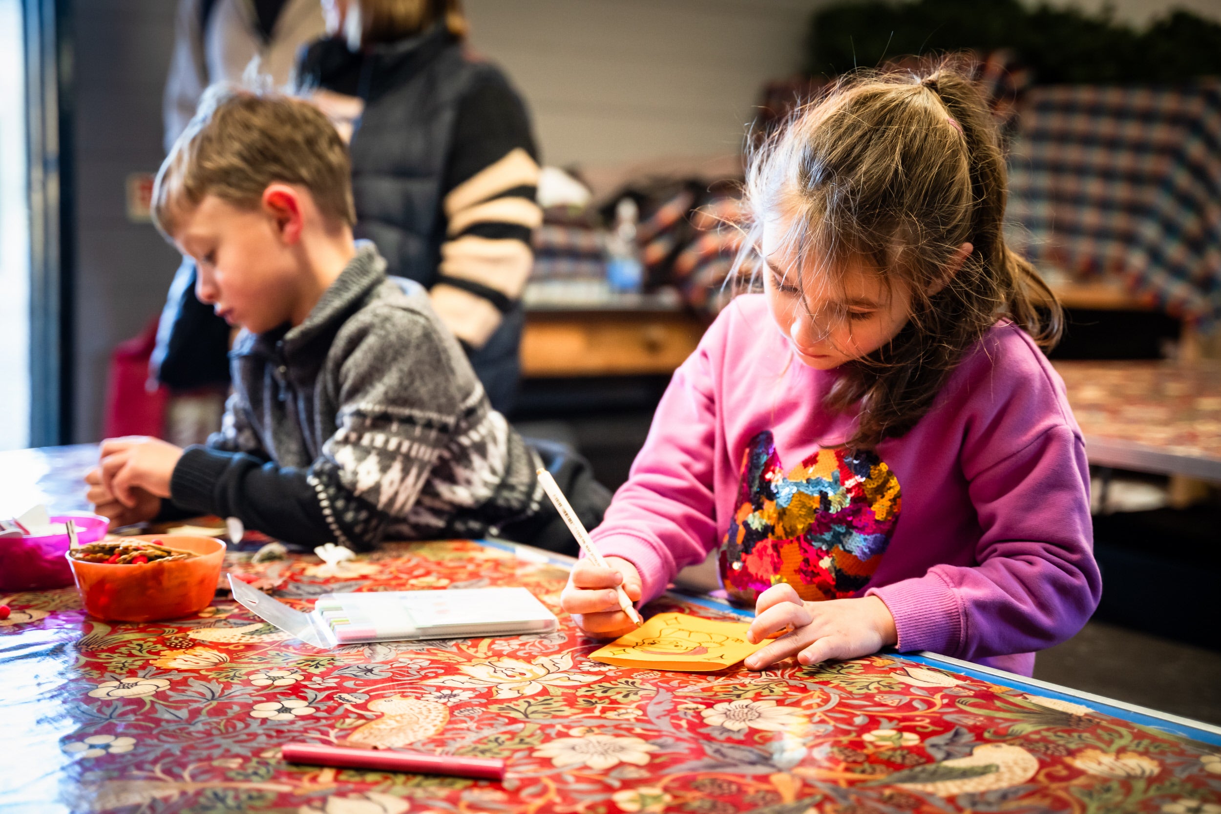 Children engaging in Christmas crafting