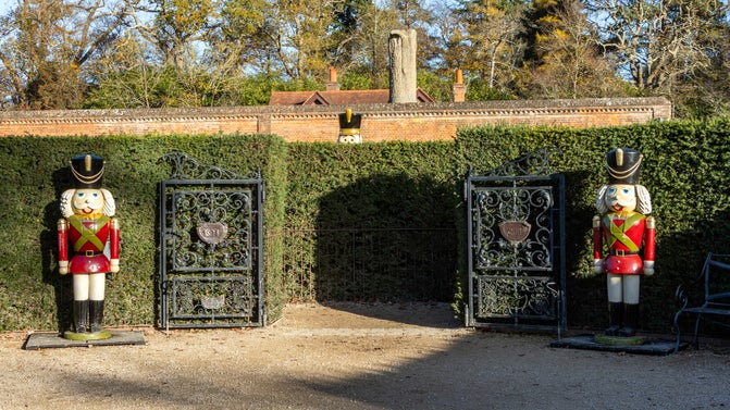 Two giant nutcrackers outside the maze in the Water Garden