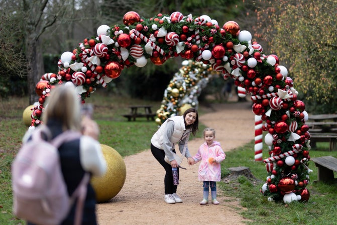 Visitors in the bauble arches in the picnic area