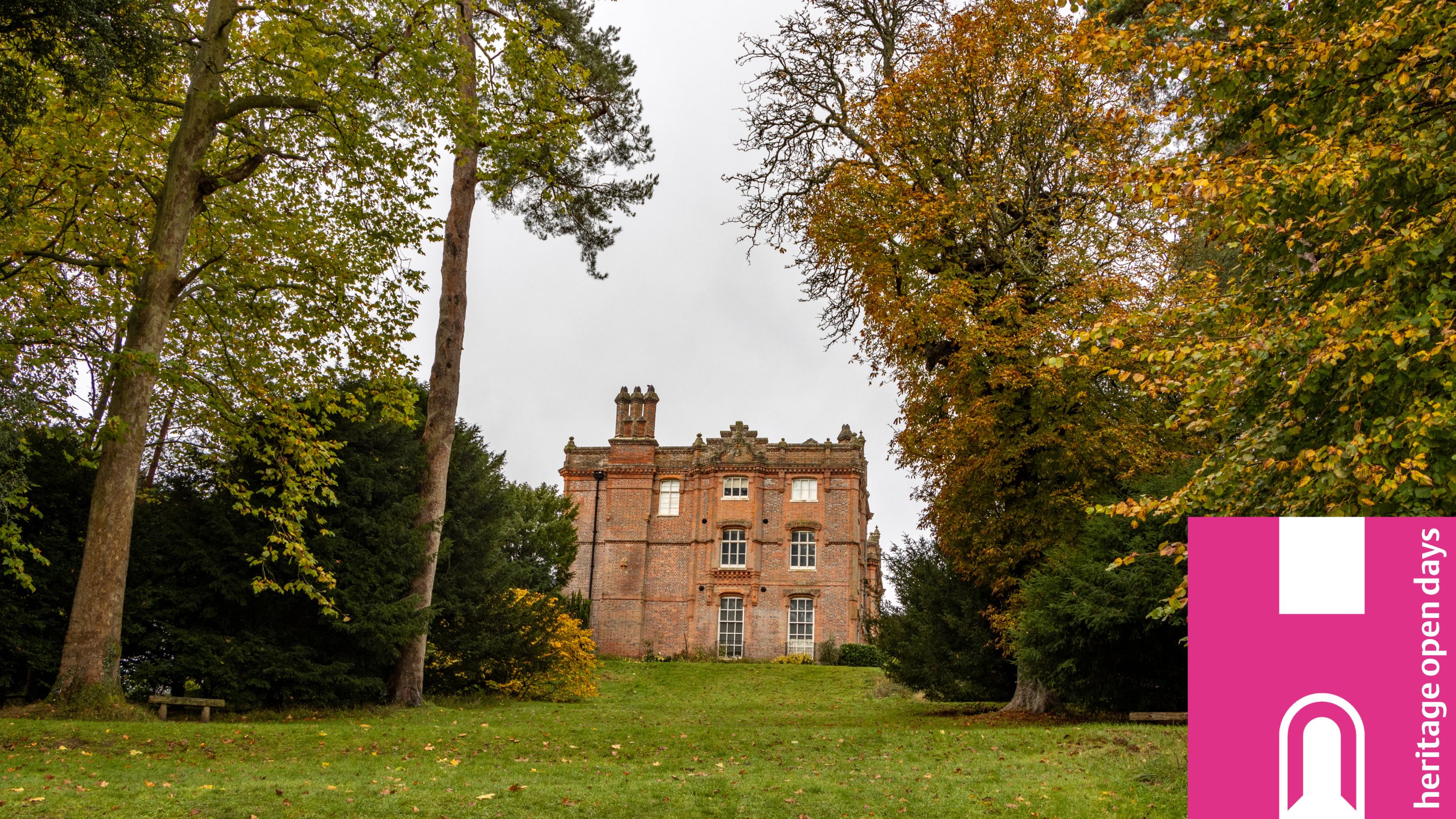 View of ha-ha and house with the pink and white Heritage Open Days logo in the bottom right corner