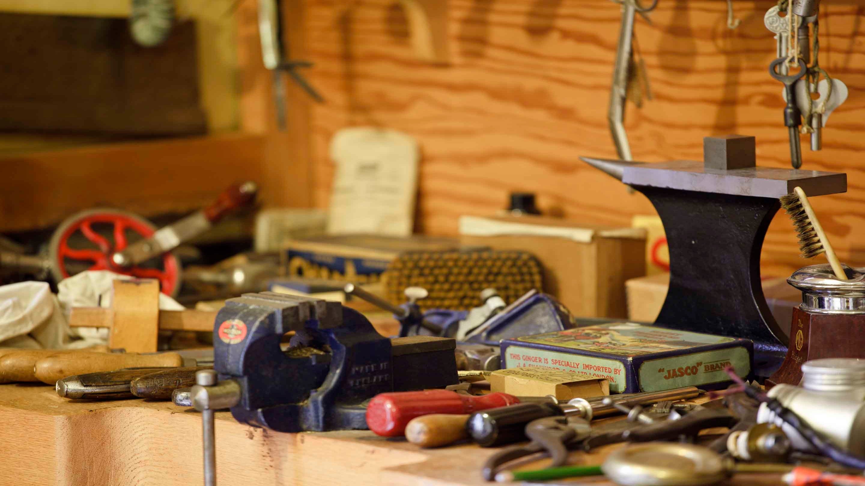 A selection of mid-century tools displayed in a cupboard in Lord Nuffield's Bedroom at Nuffield Place, Oxfordshire.