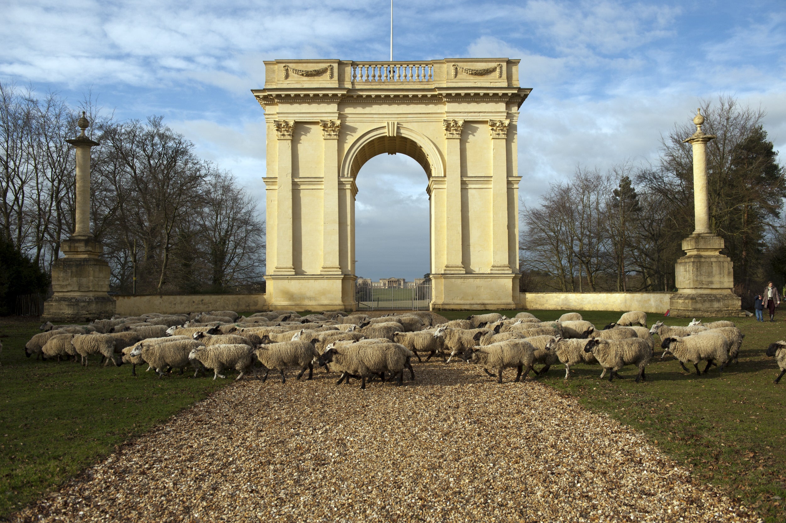Sheep crossing in front of the Corinthian Arch at Stowe