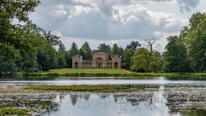 A view of the Temple of Venus at Stowe in Buckinghamshire across the lake