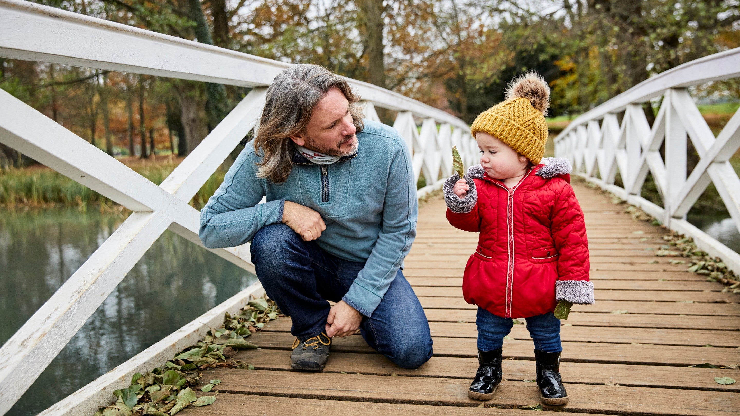 Visitors in the garden in autumn at Stowe, Buckinghamshire