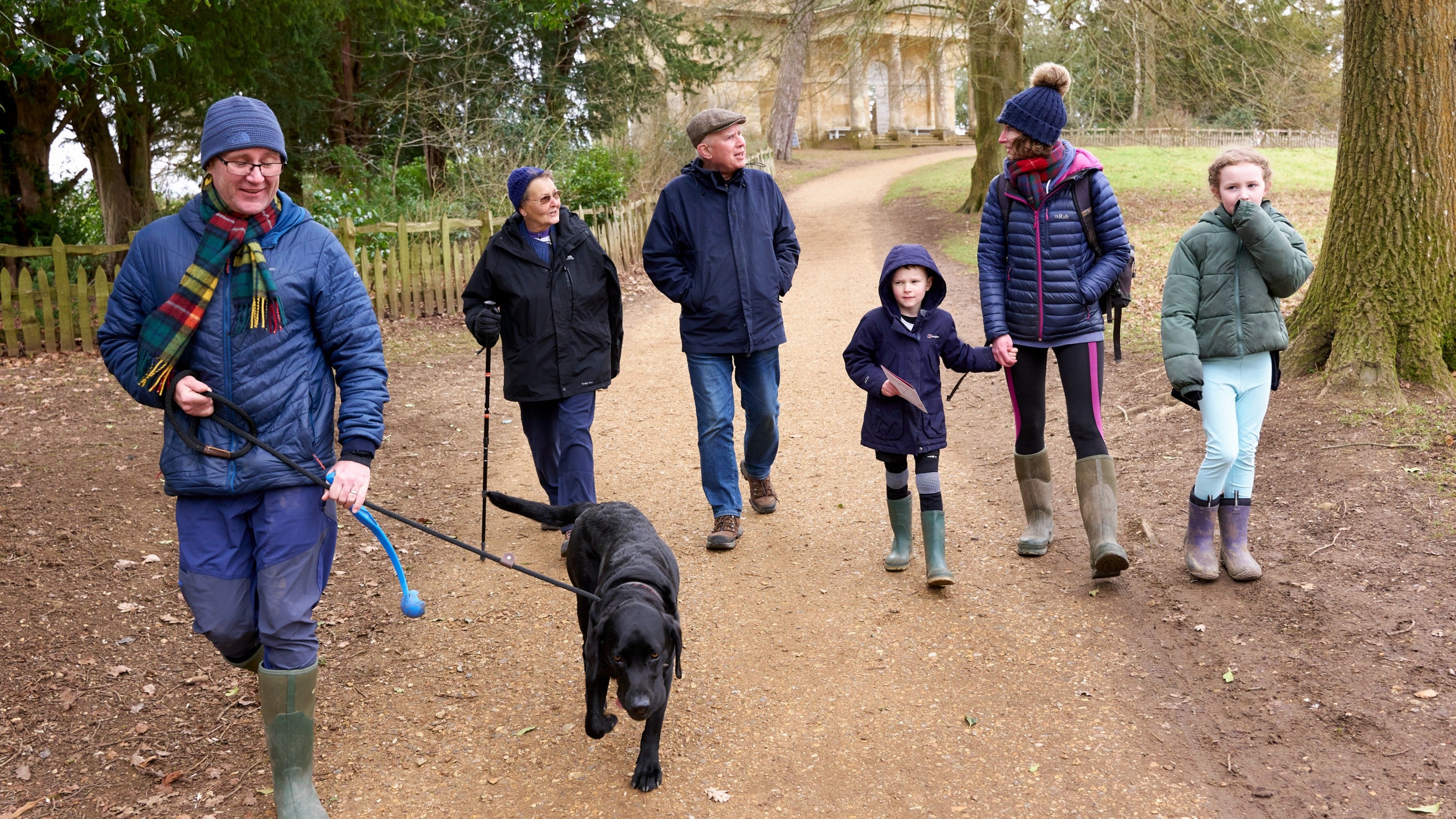 Visitors on a winter dog walk at Stowe, Buckinghamshire