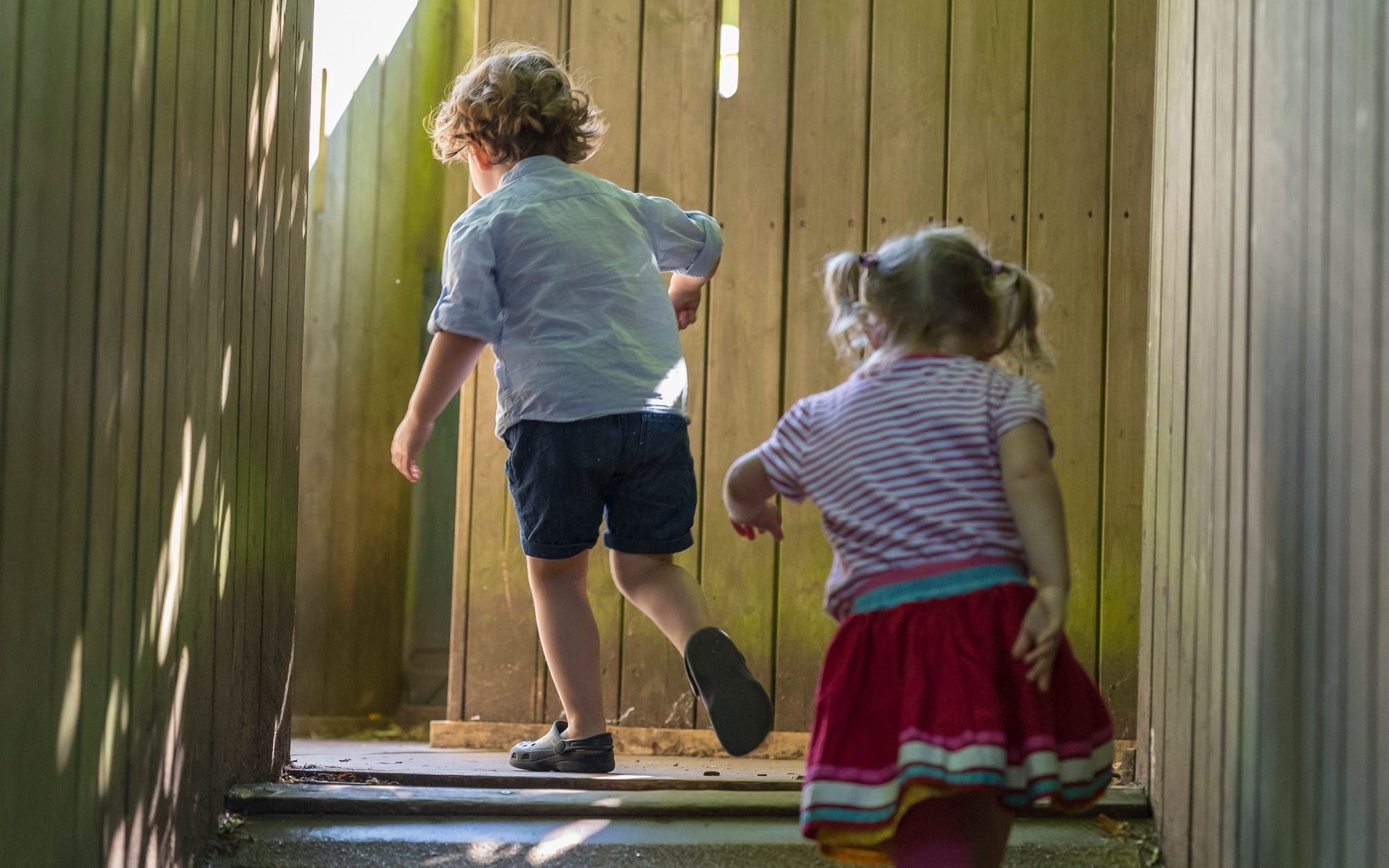 Children playing in Woodland Playground at Waddesdon