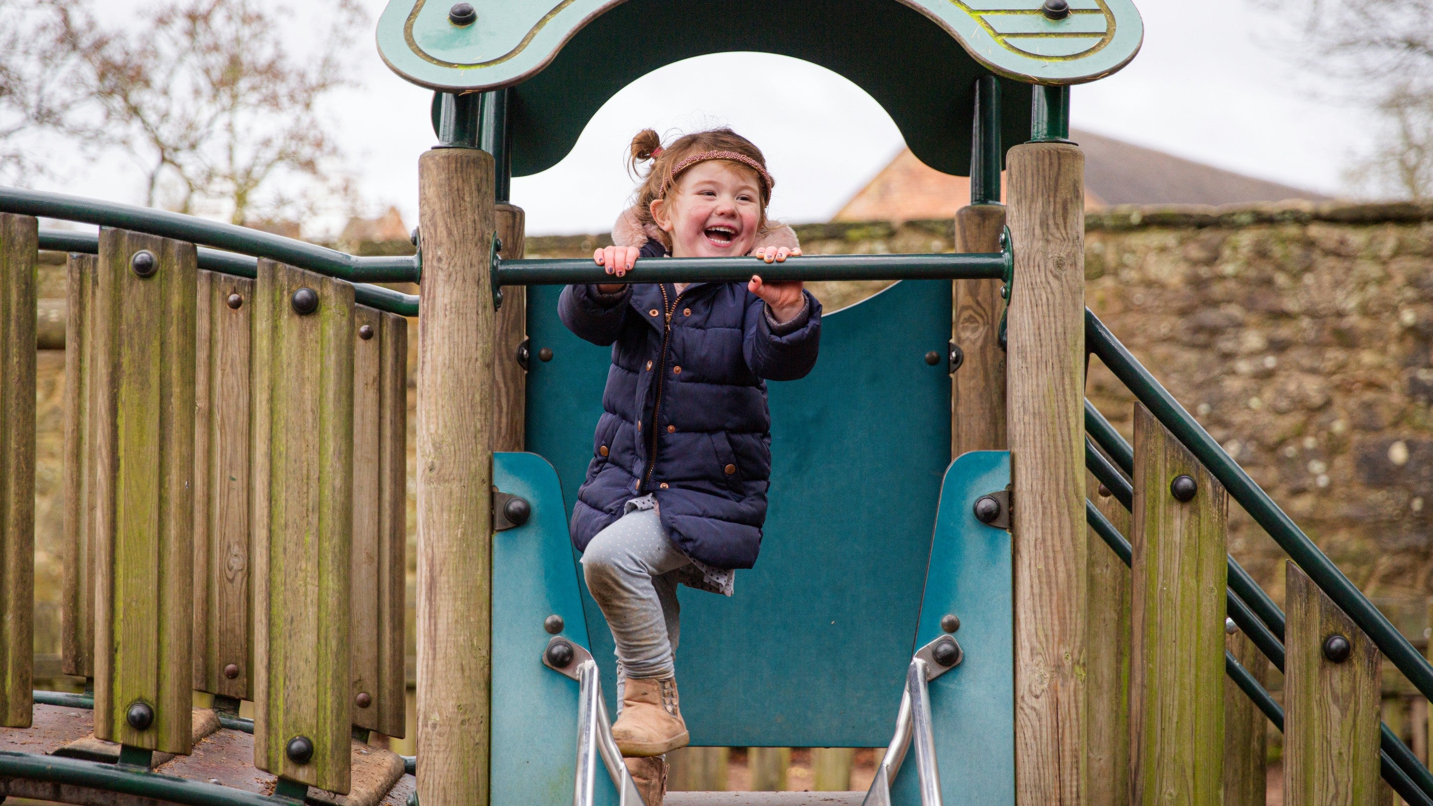 Fun in the outdoors play area at Calke Abbey, Derbyshire