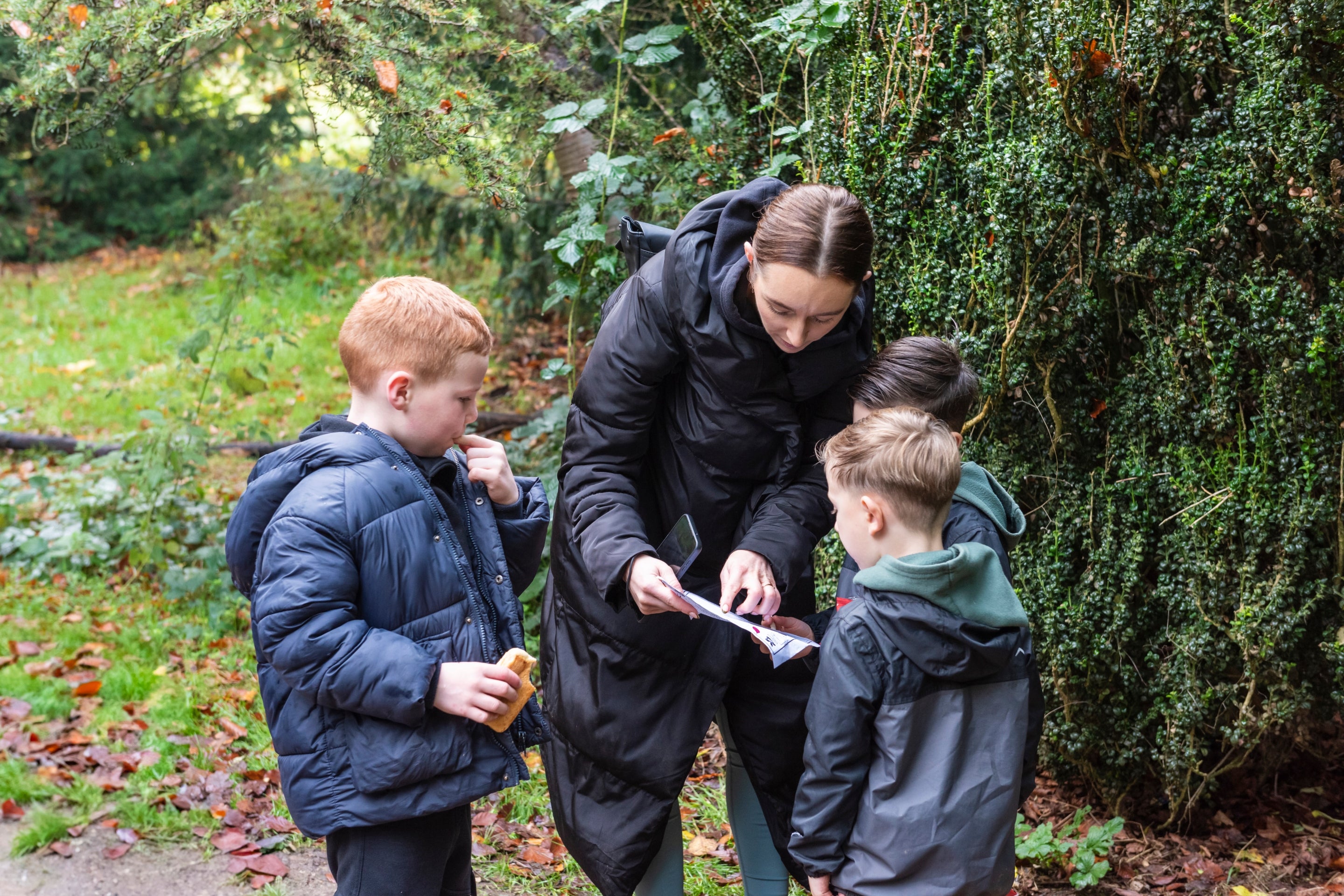 Families exploring the gardens and and the wider landscape at Calke Abbey, Derbyshire
