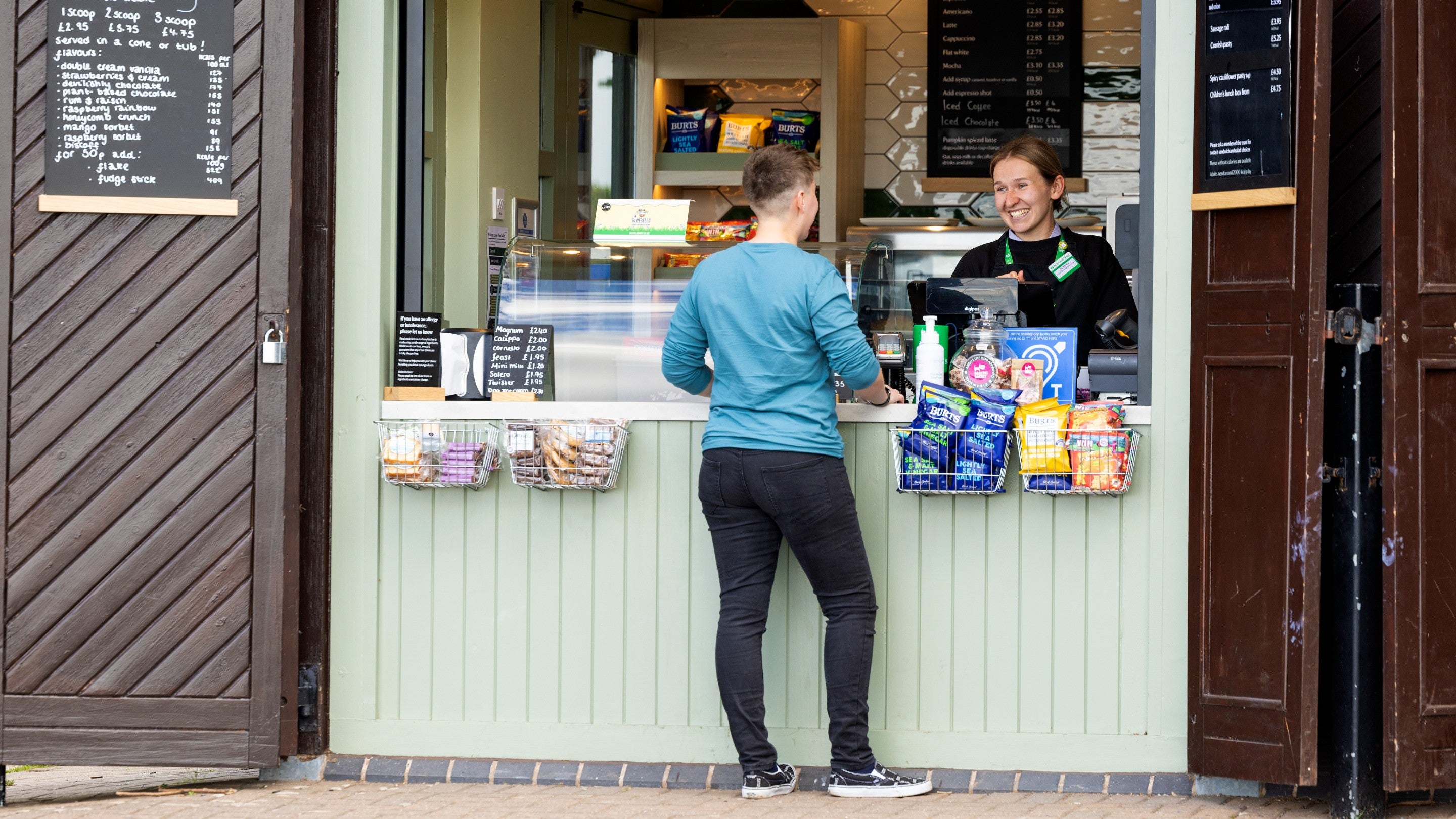 Visitor purchasing refreshments from the kiosk at Foremark, Derbyshire