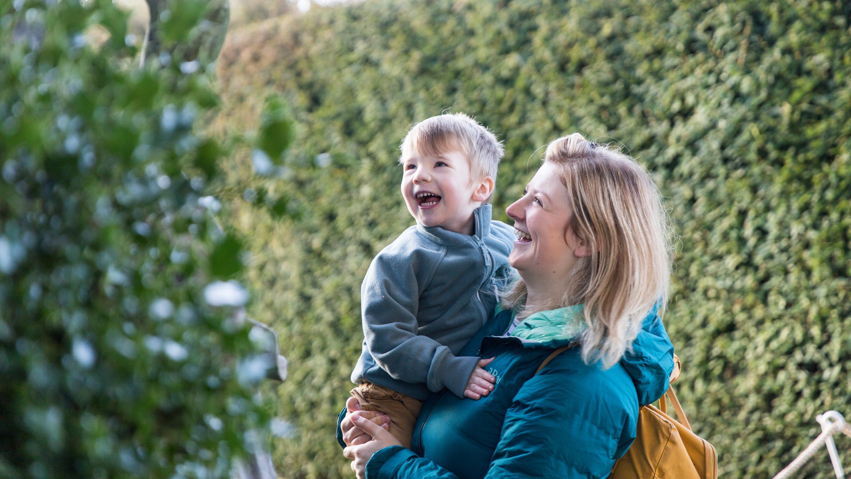 Family exploring the gardens at Hardwick, Derbyshire