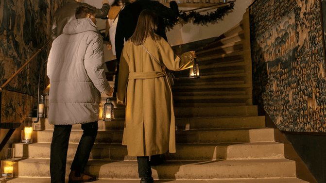 Visitors exploring by lantern light at Hardwick, Derbyshire