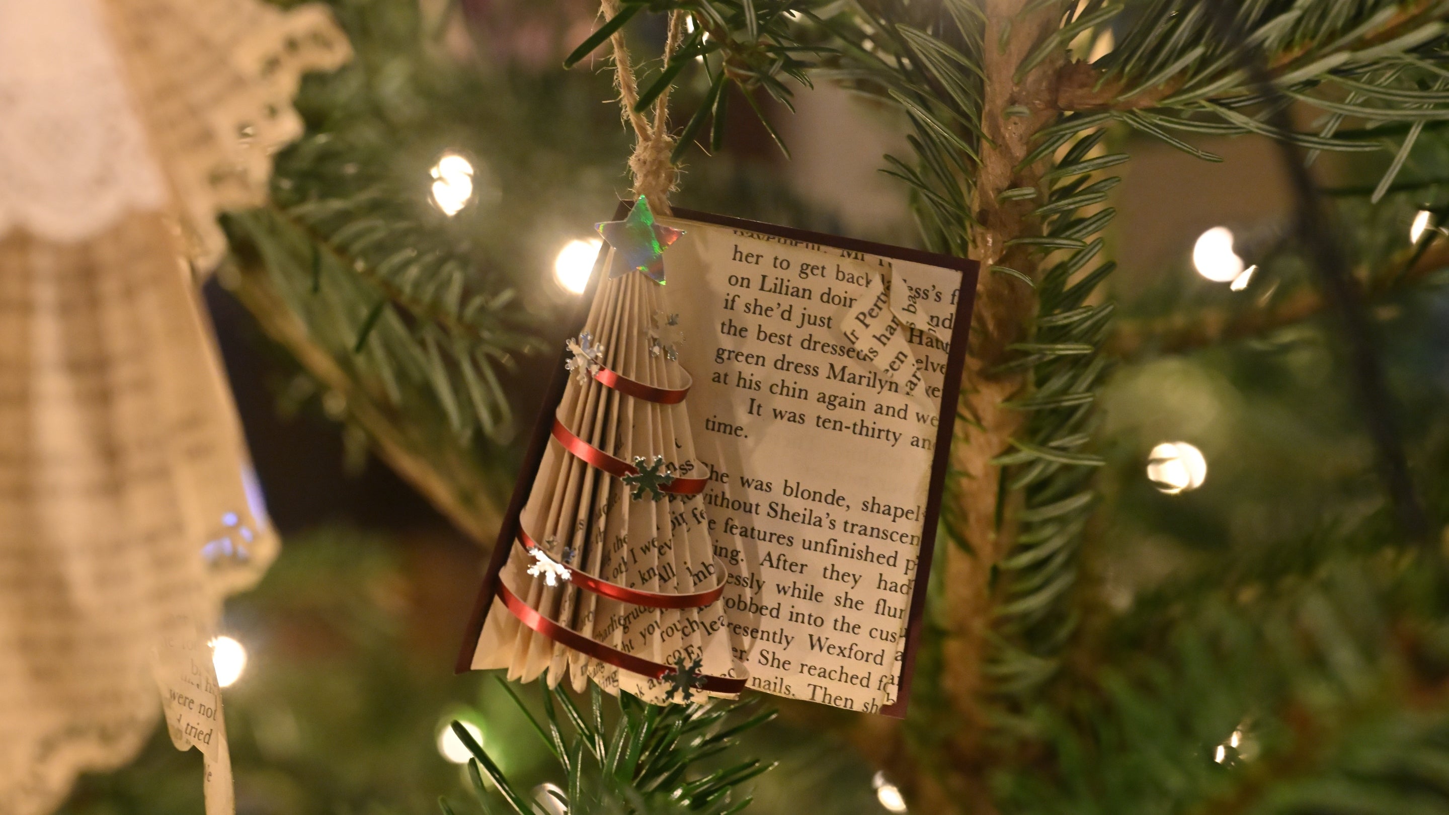 Close up of a hand made decoration made using book paper