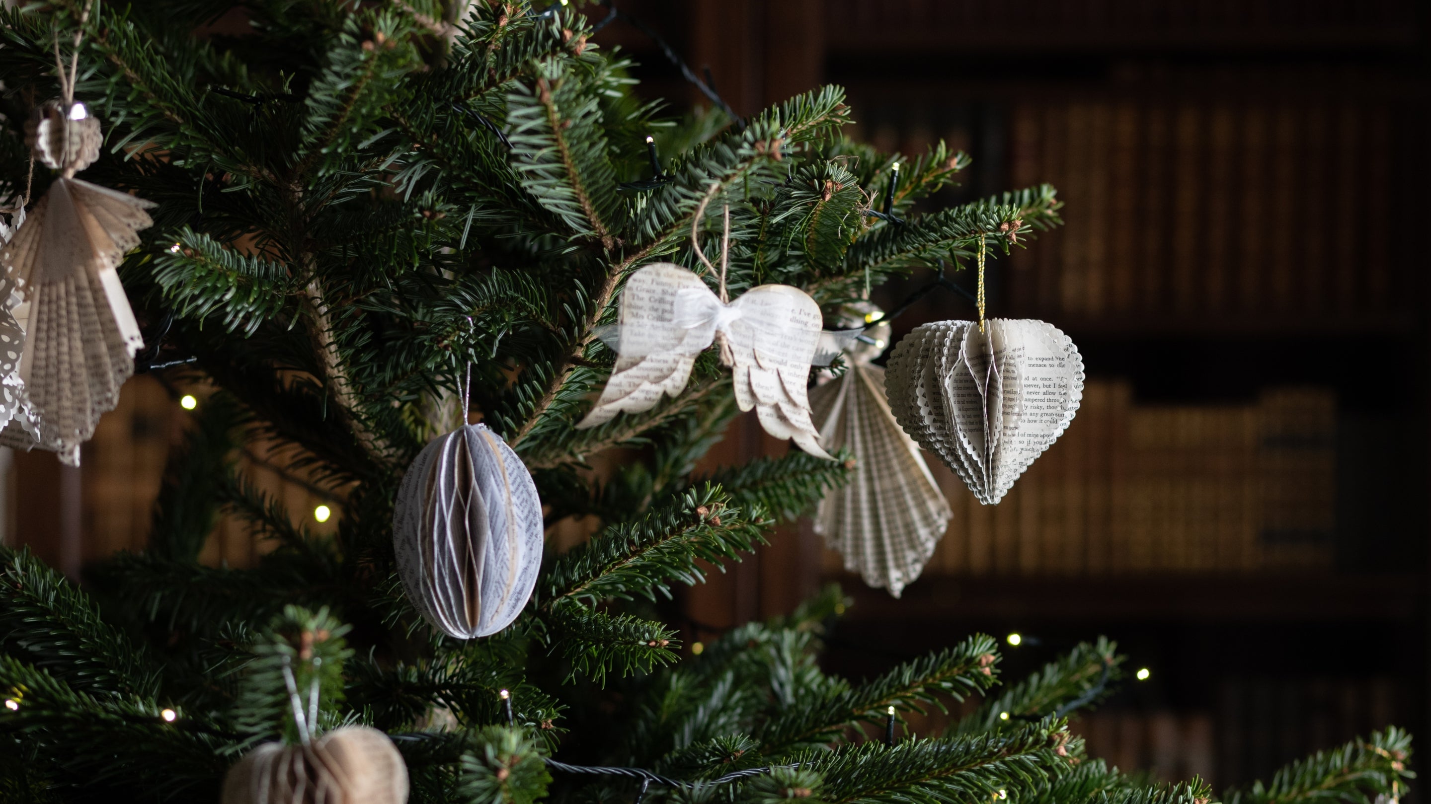 Handmade paper decorations on a Christmas tree