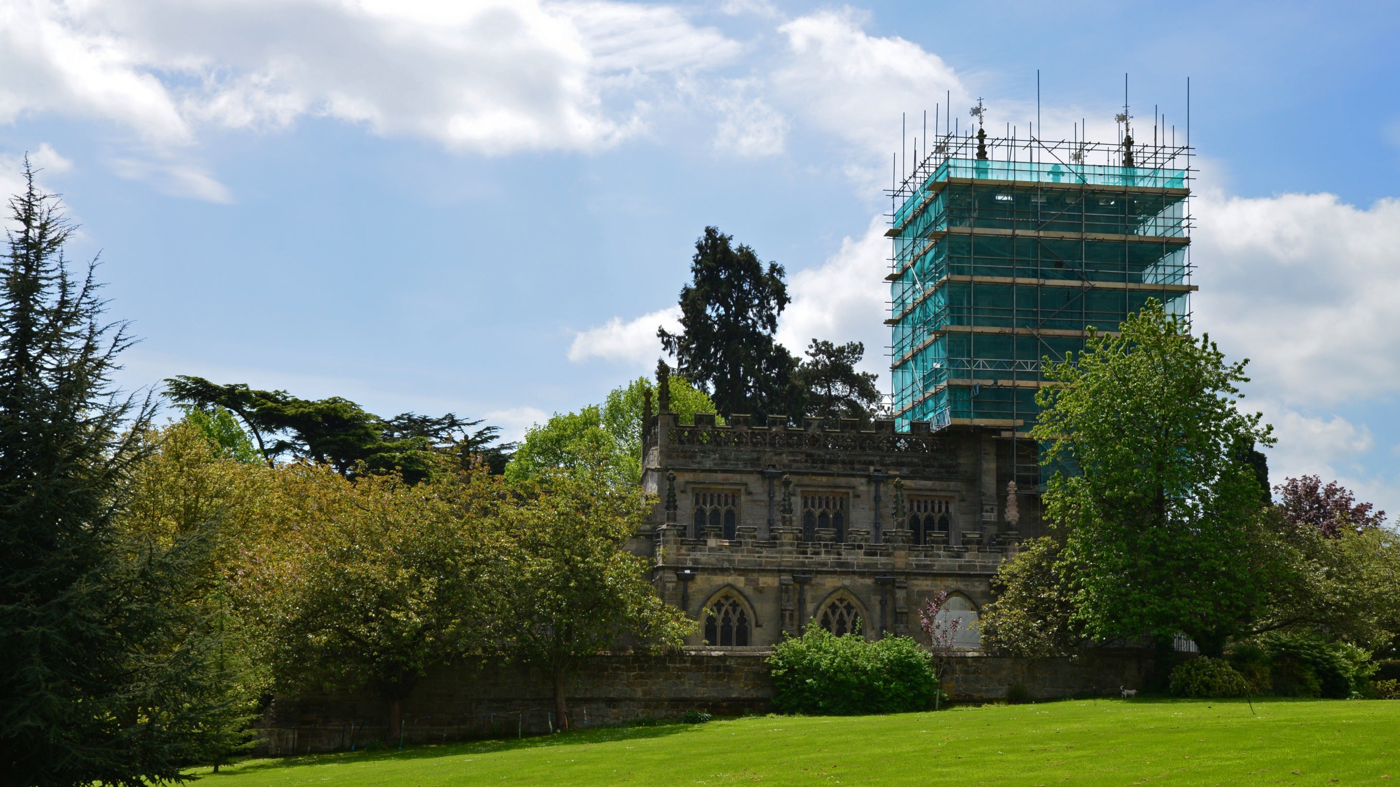 A view of Staunton Harold Church in Leicestershire with the tower covered in scaffolding while conservation work is undertaken