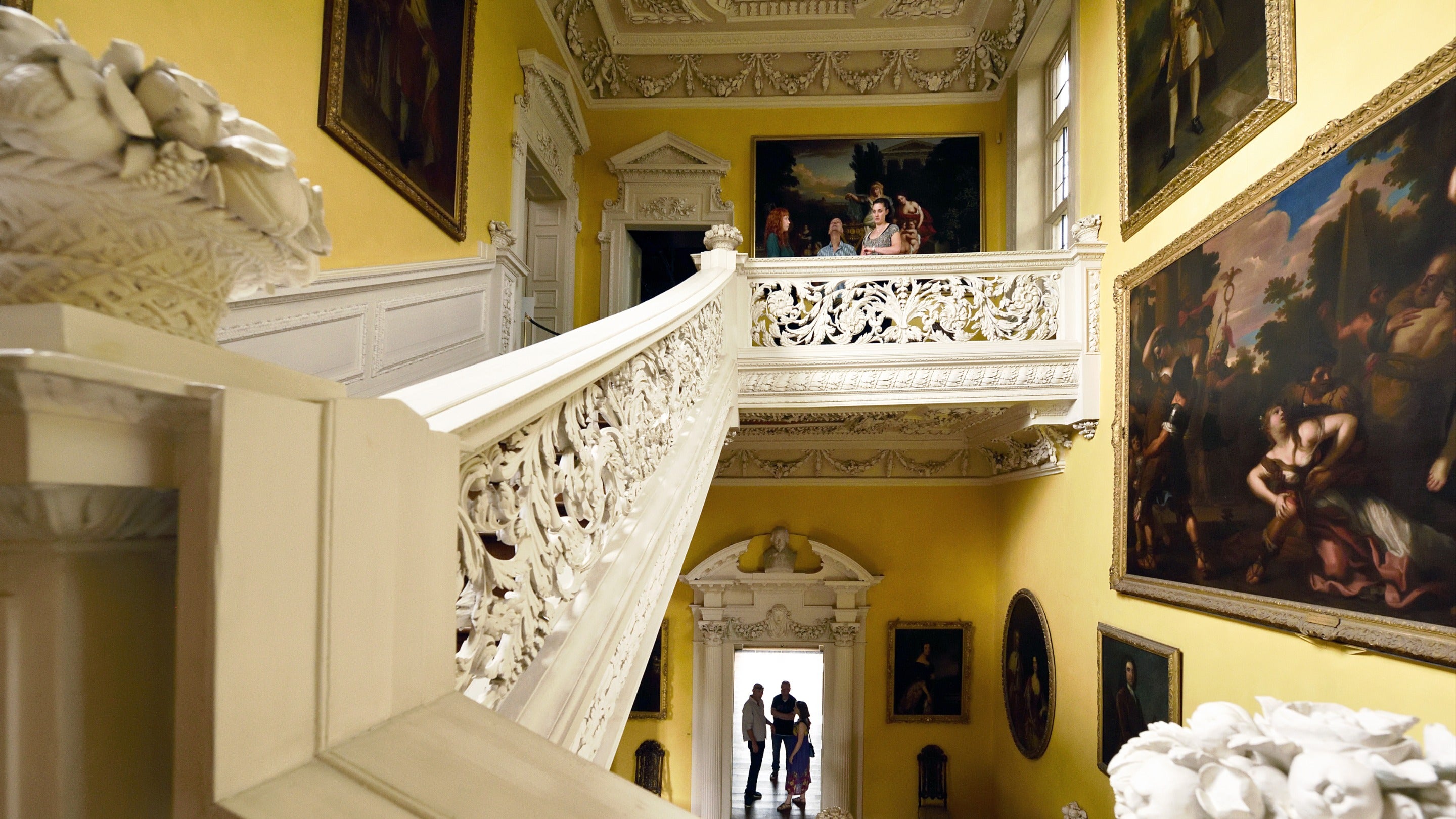 Visitors in the Staircase Hall at The Children's Country House at Sudbury, Derbyshire