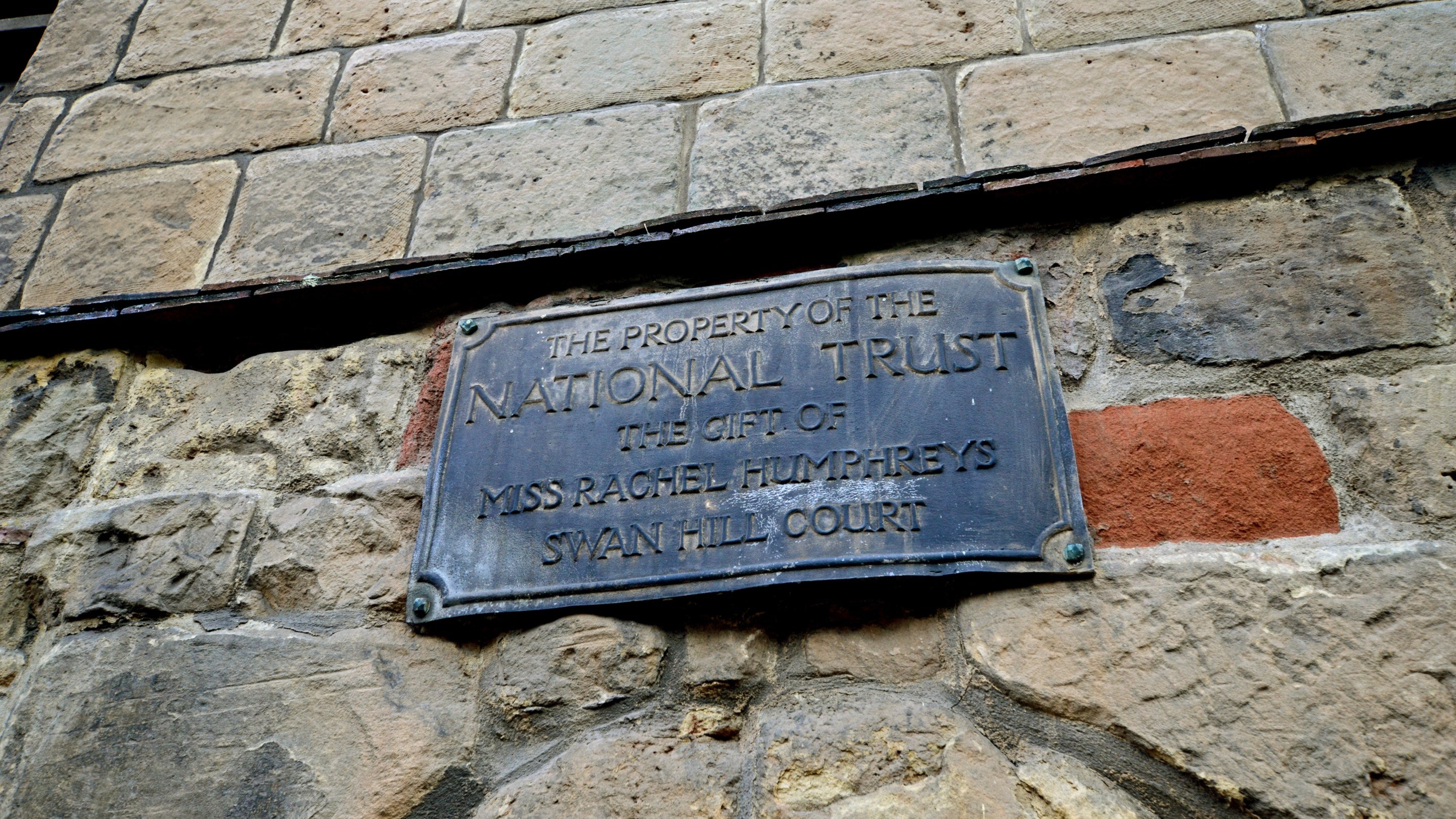 Close up view of the plaque above door at Town Walls Tower, Shropshire