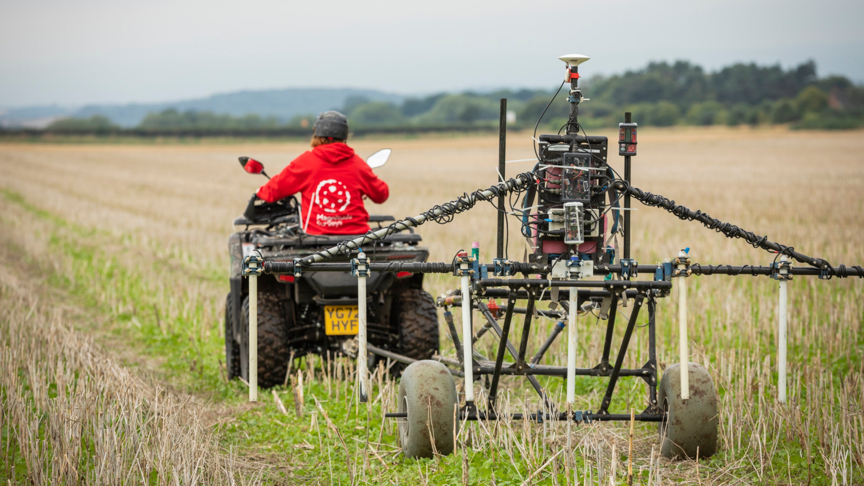 Technician undertaking geophysical survey at Attingham Park, Shropshire