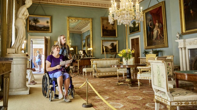 Visitors exploring the house at Attingham Park, Shropshire