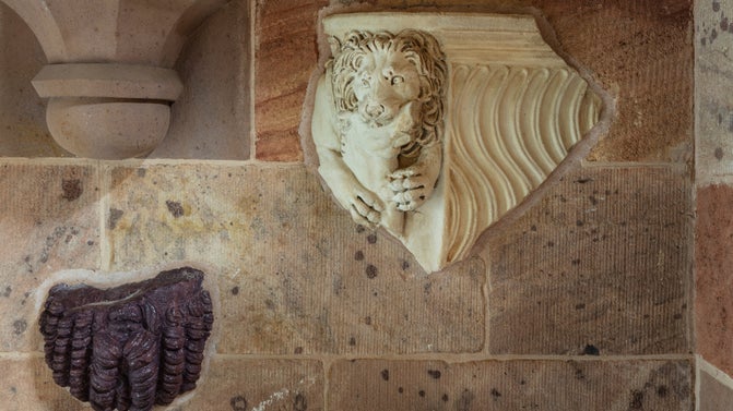 A view of one of the Roman Marbles at Biddulph Grange Garden. It depicts a lion's head.