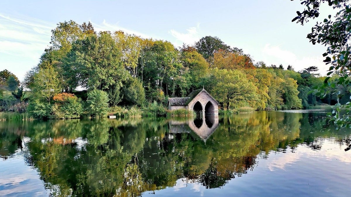 The boathouse and Big Pool on the Dingle walk at Dudmaston, Shropshire