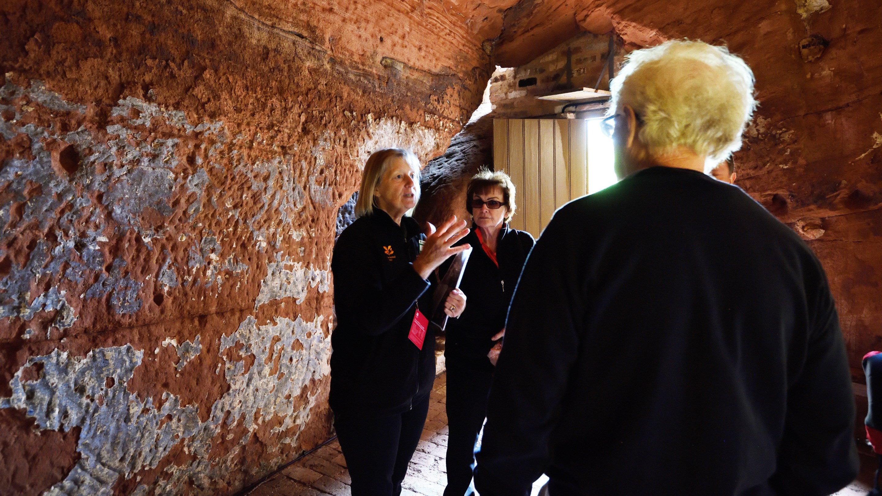 Visitors on a tour of the famous Holy Austin Rock Houses at Kinver Edge and the Rock Houses, Staffordshire