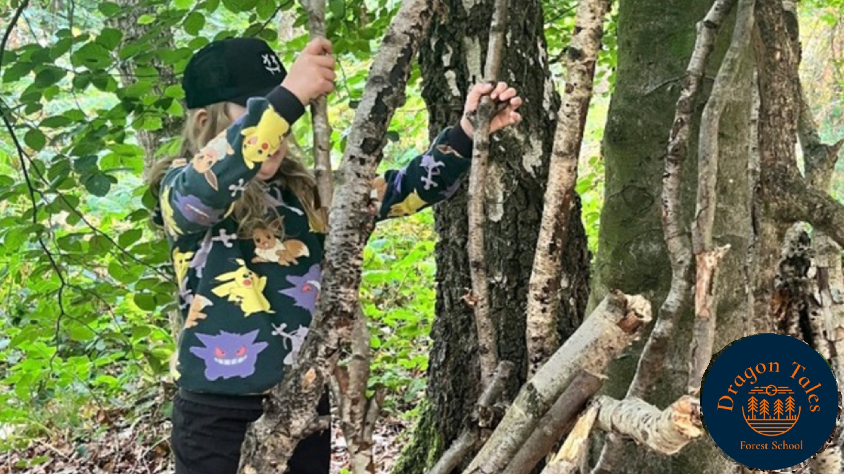 Child building a den from branches