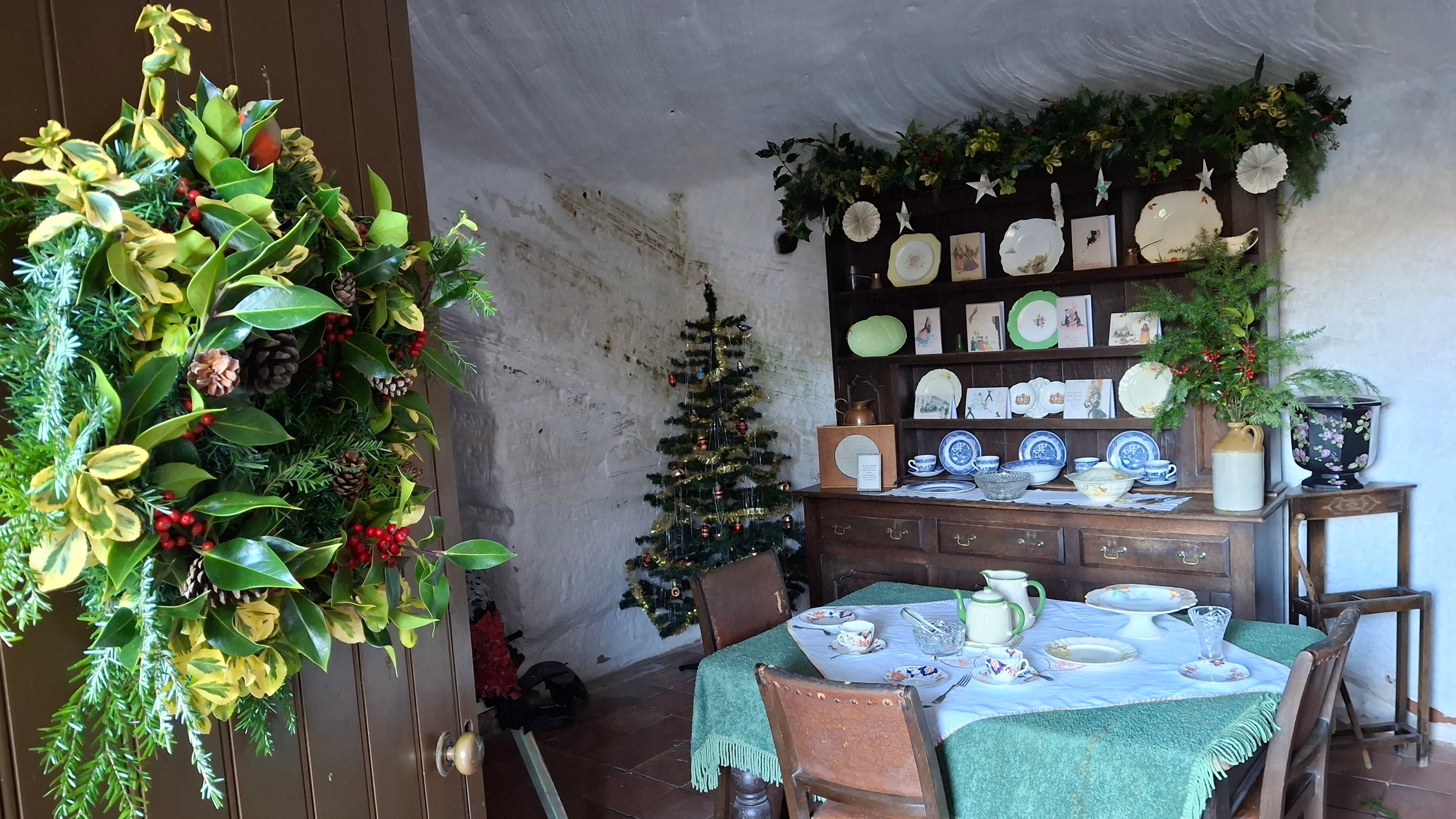 Rock house interior, decorated for Christmas
