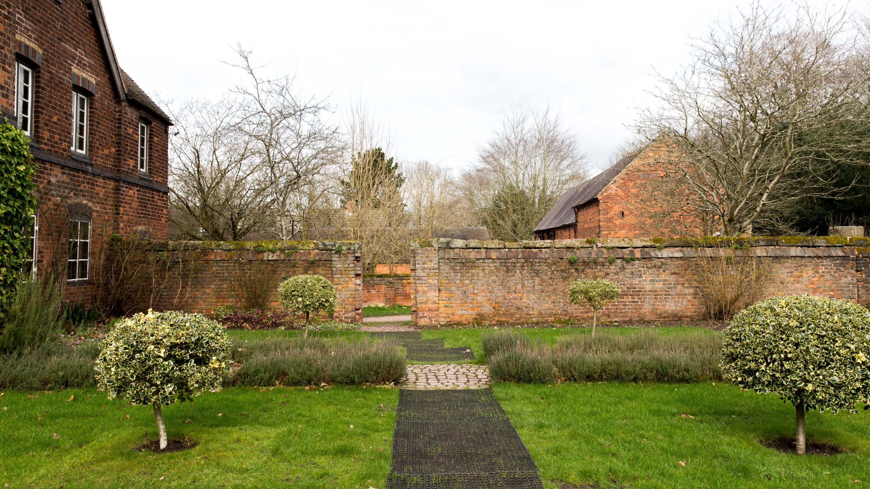 Garden in early spring at Moseley Old Hall