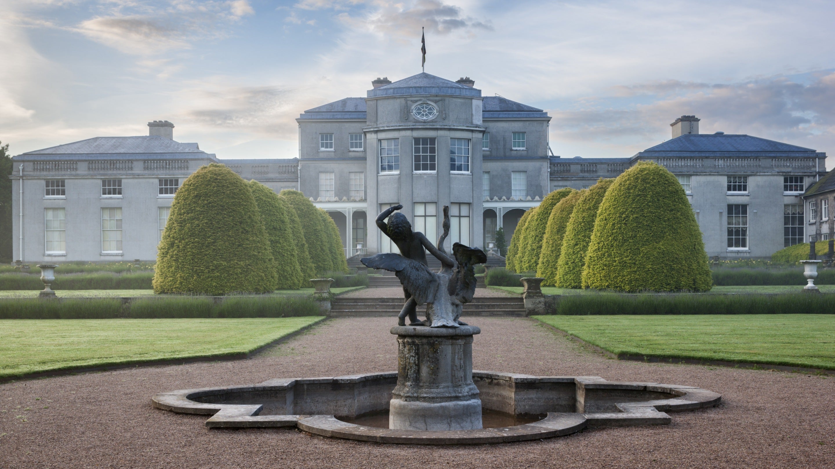 The west front on a misty dawn in June on the Shugborough Estate, Staffordshire