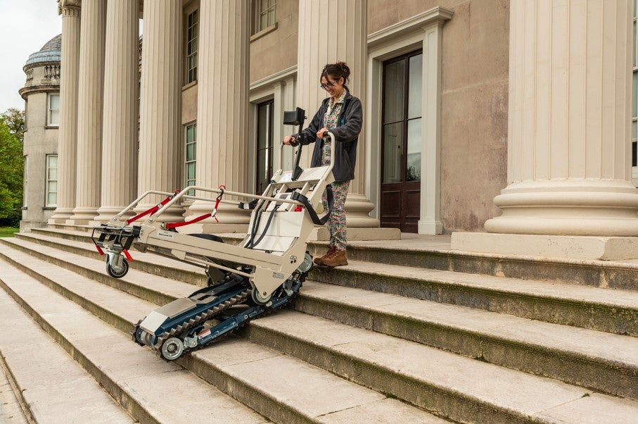 Woman demonstrating the stairclimber at Shugborough Estate