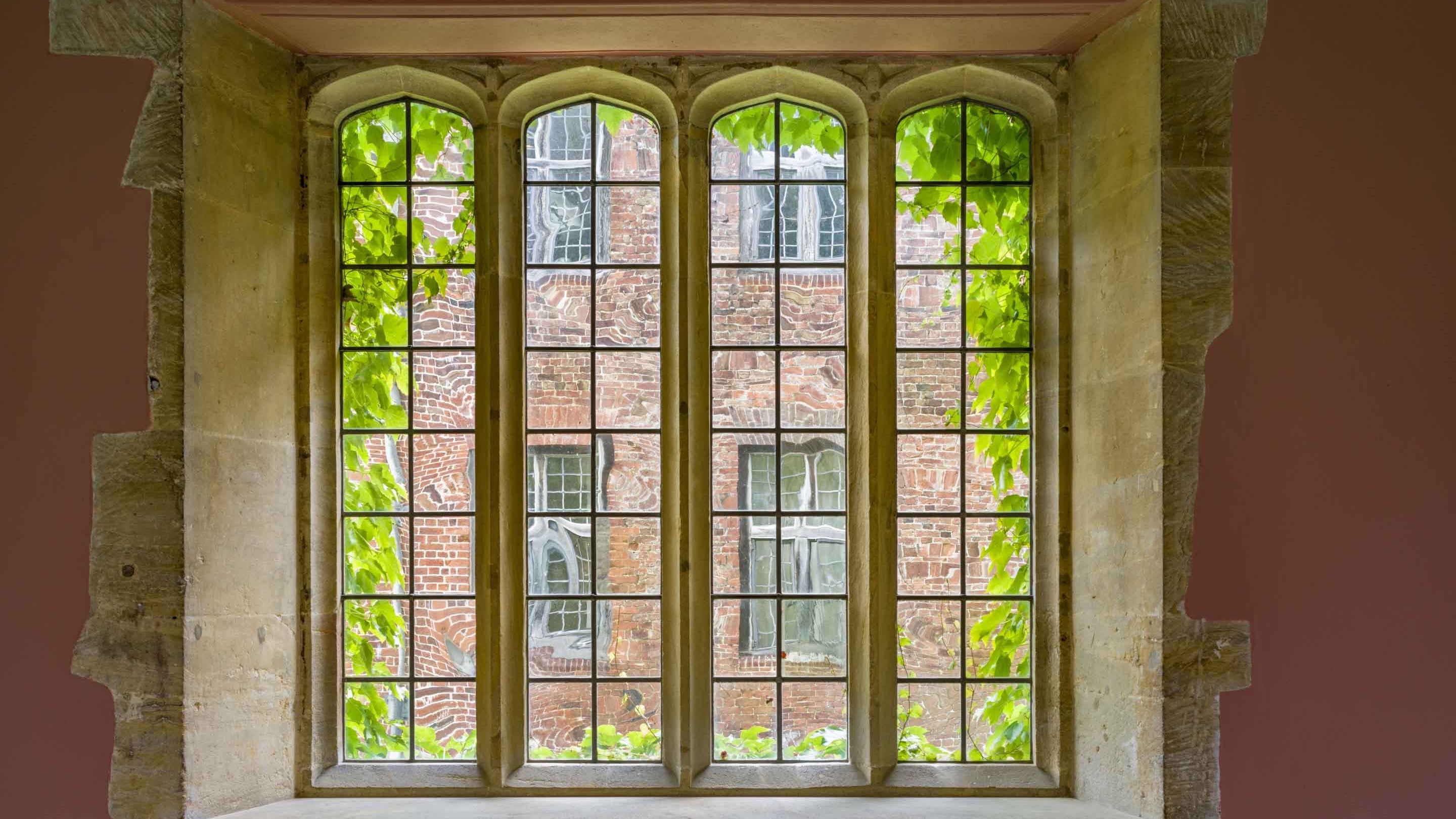 View through a window in the Old Kitchen at Barrington Court, Somerset.
