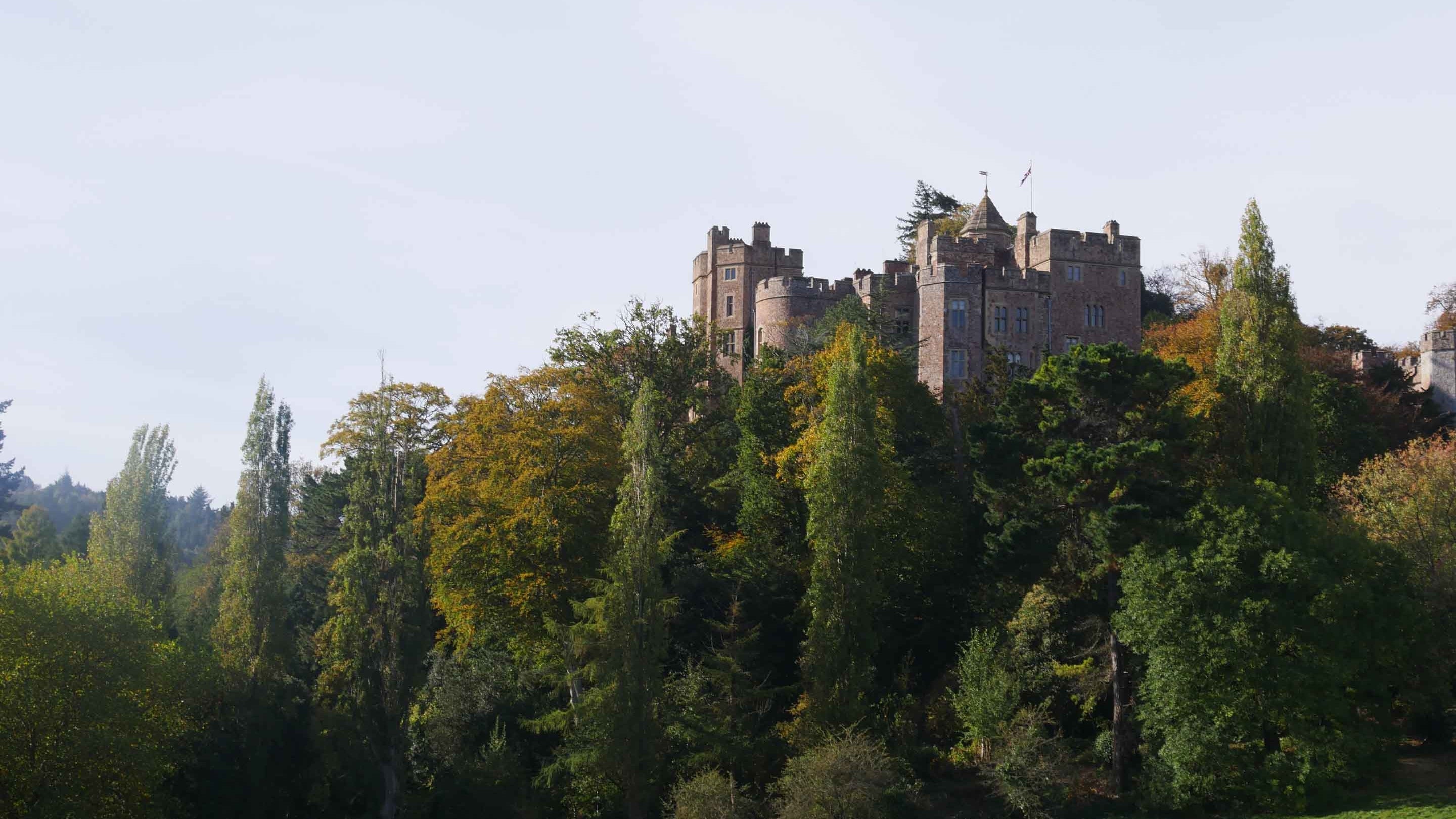 View of Dunster Castle, Somerset from the parkland