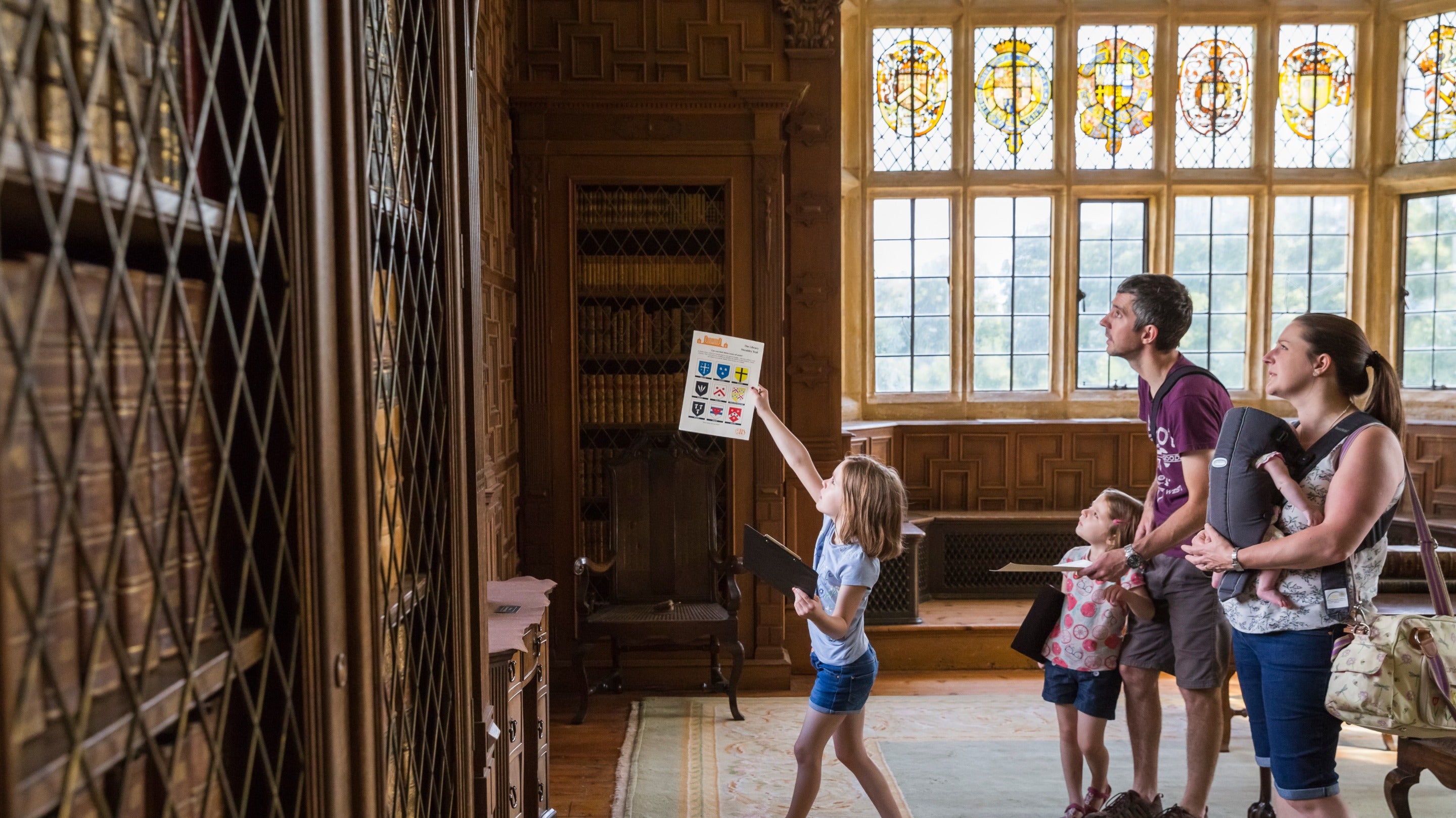 Visitors in the Library at Montacute House, Somerset