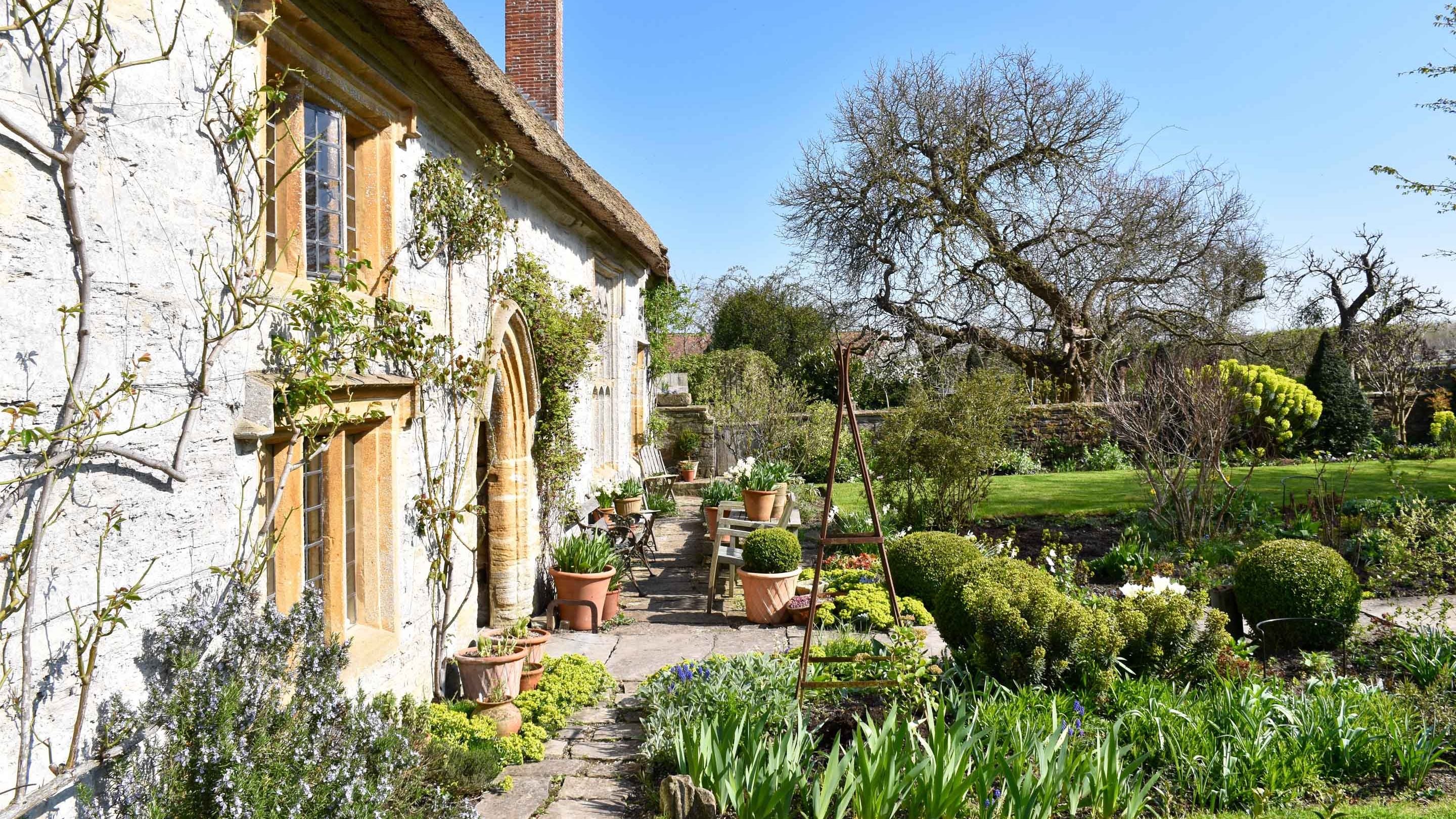 The house and garden in spring at Priest's House, Muchelney, Somerset