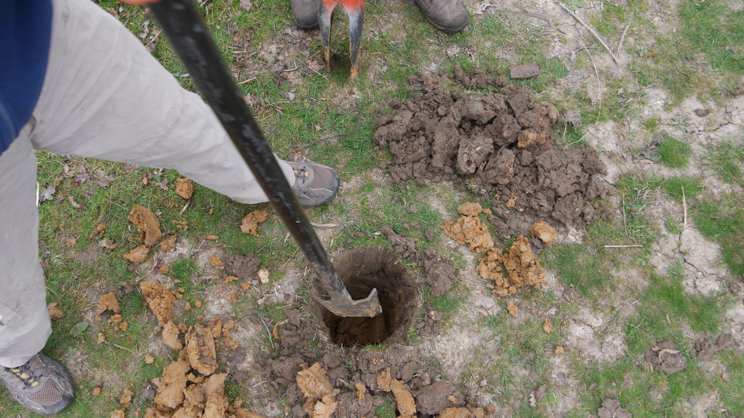 Installing new waymarkers at Flatford, Suffolk