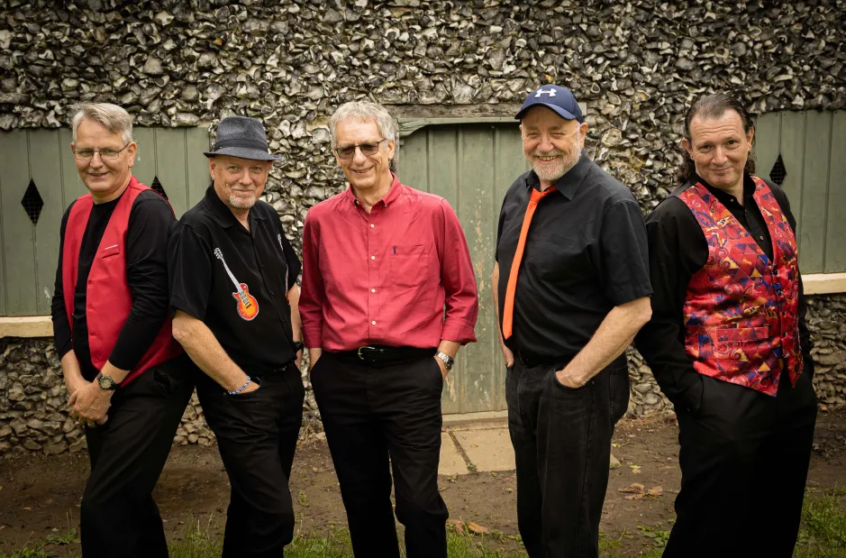 Shades of Simon band members pose for a promotional photograph