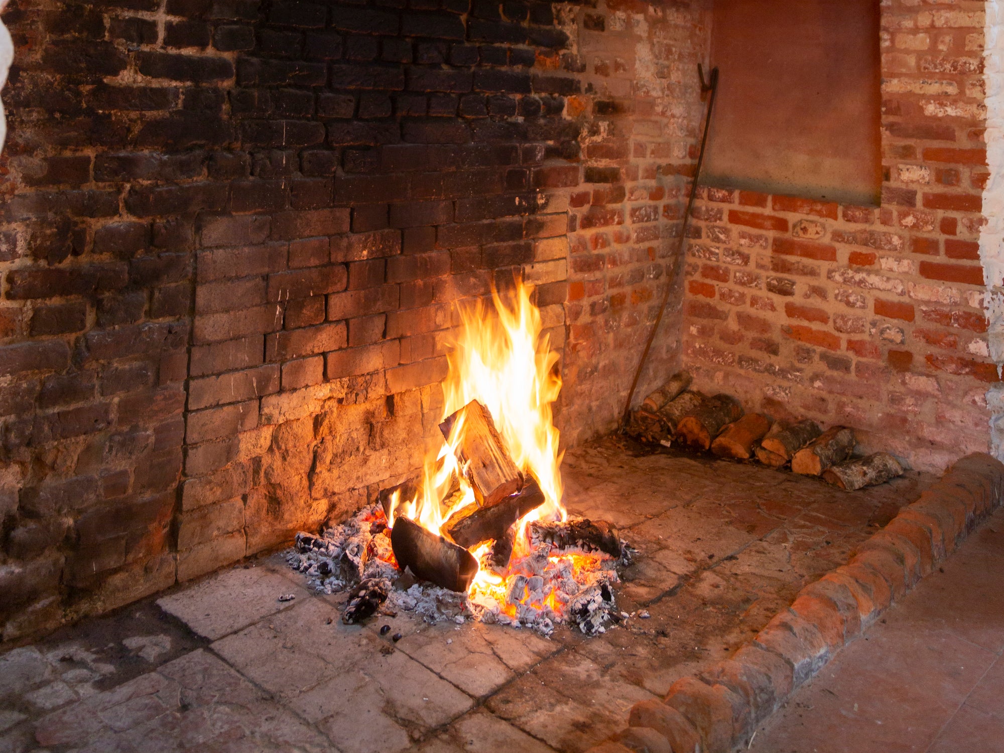 The log fire roars at Valley Farm, Flatford