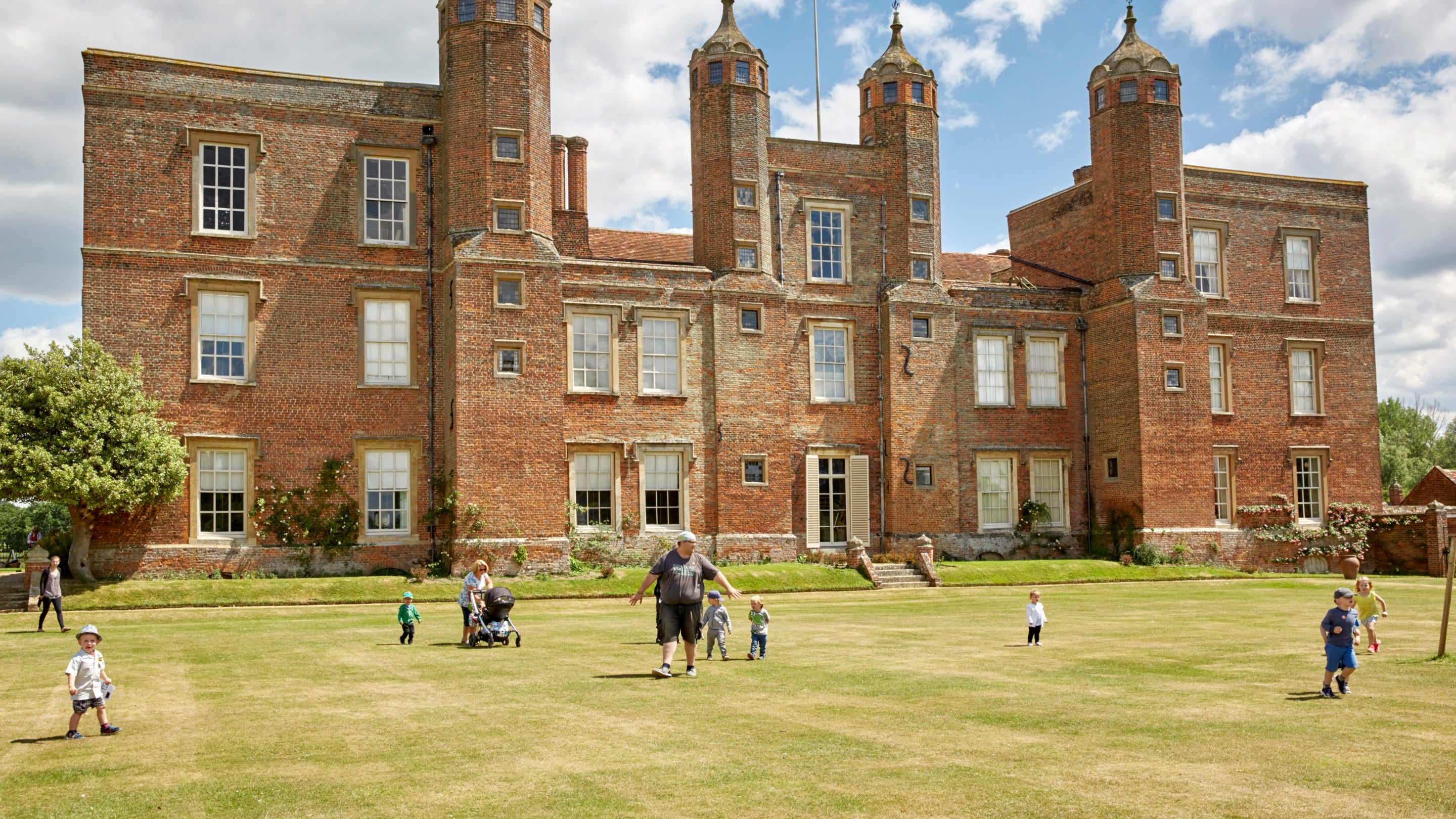 Visitors in the garden at Melford Hall, Suffolk