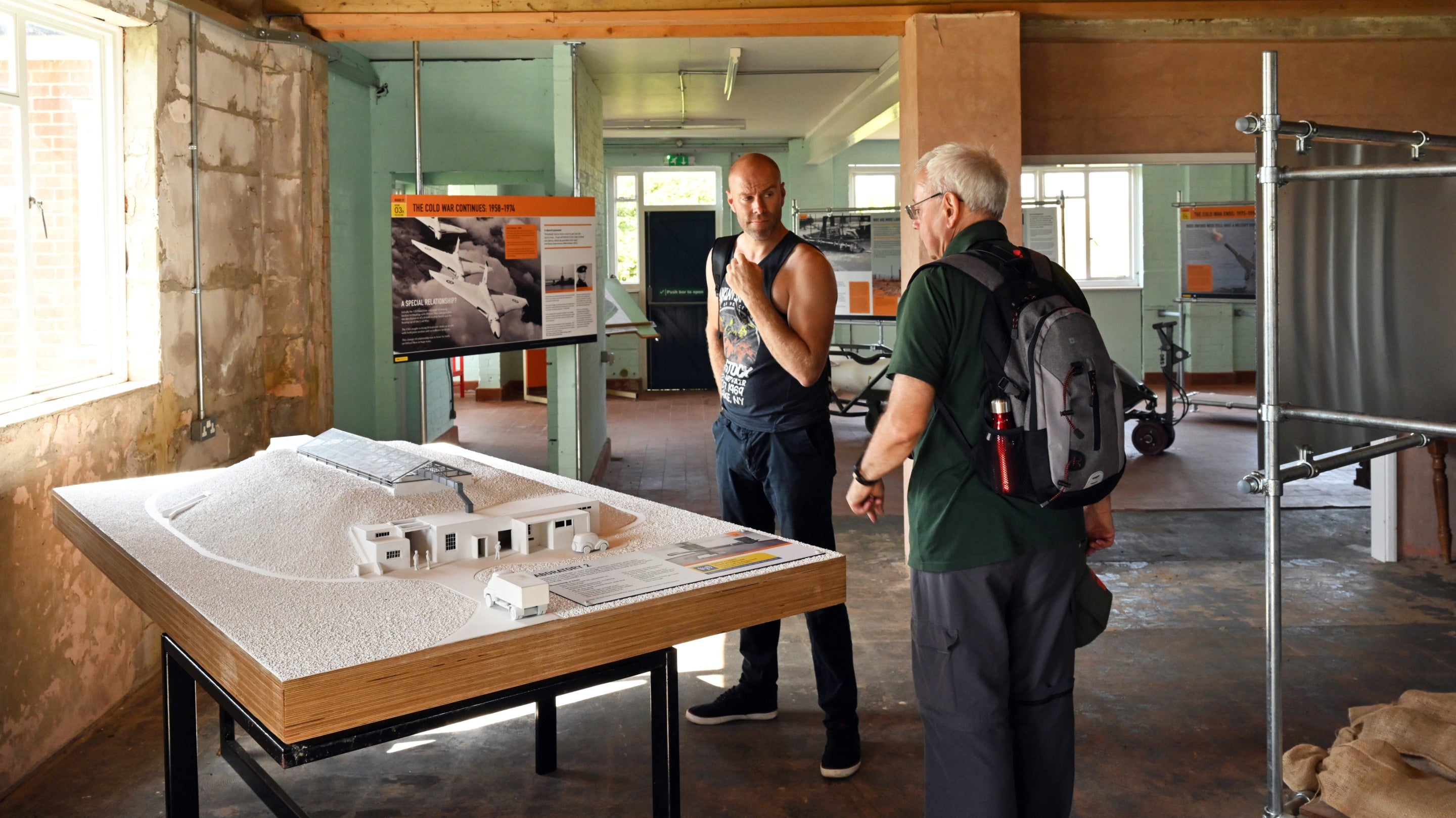 Visitors exploring the Island of Secrets exhibition at Orford Ness National Nature Reserve, Suffolk