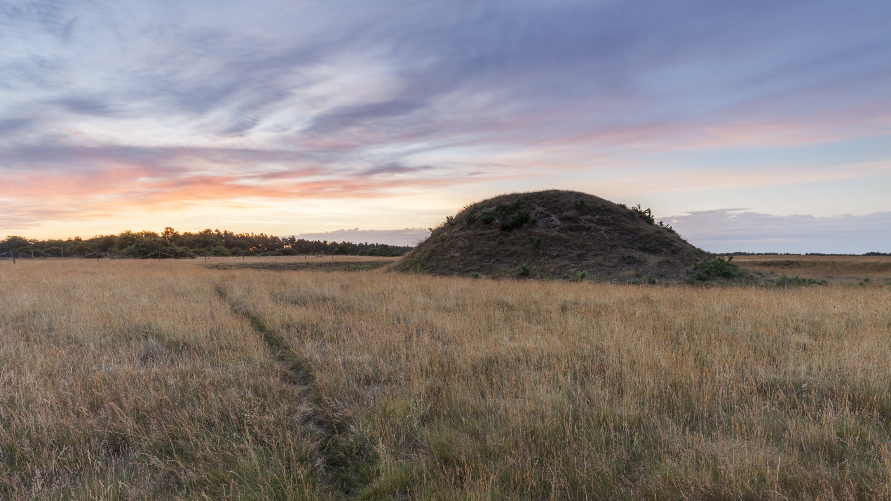 A warm sunset over the burial mounds at Sutton Hoo, Suffolk 1200332.jpg