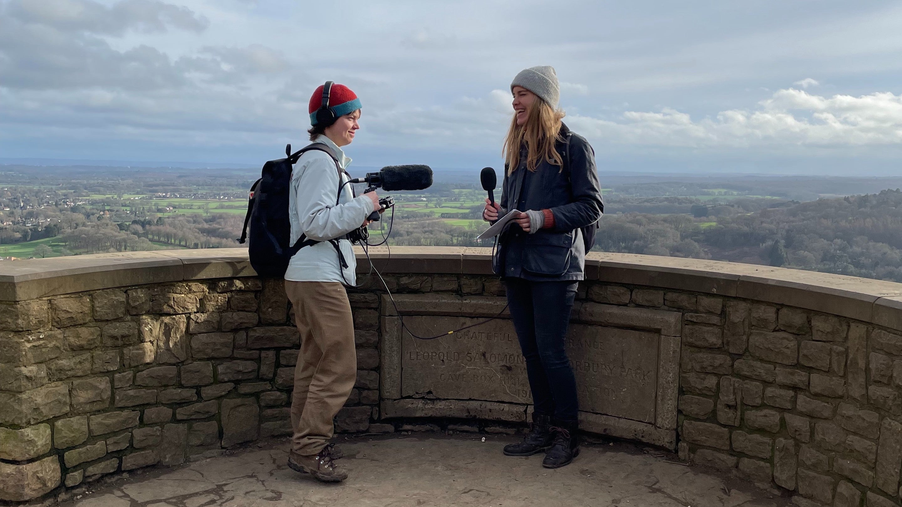 A sound recordist recording an interview at the view point at Box Hill