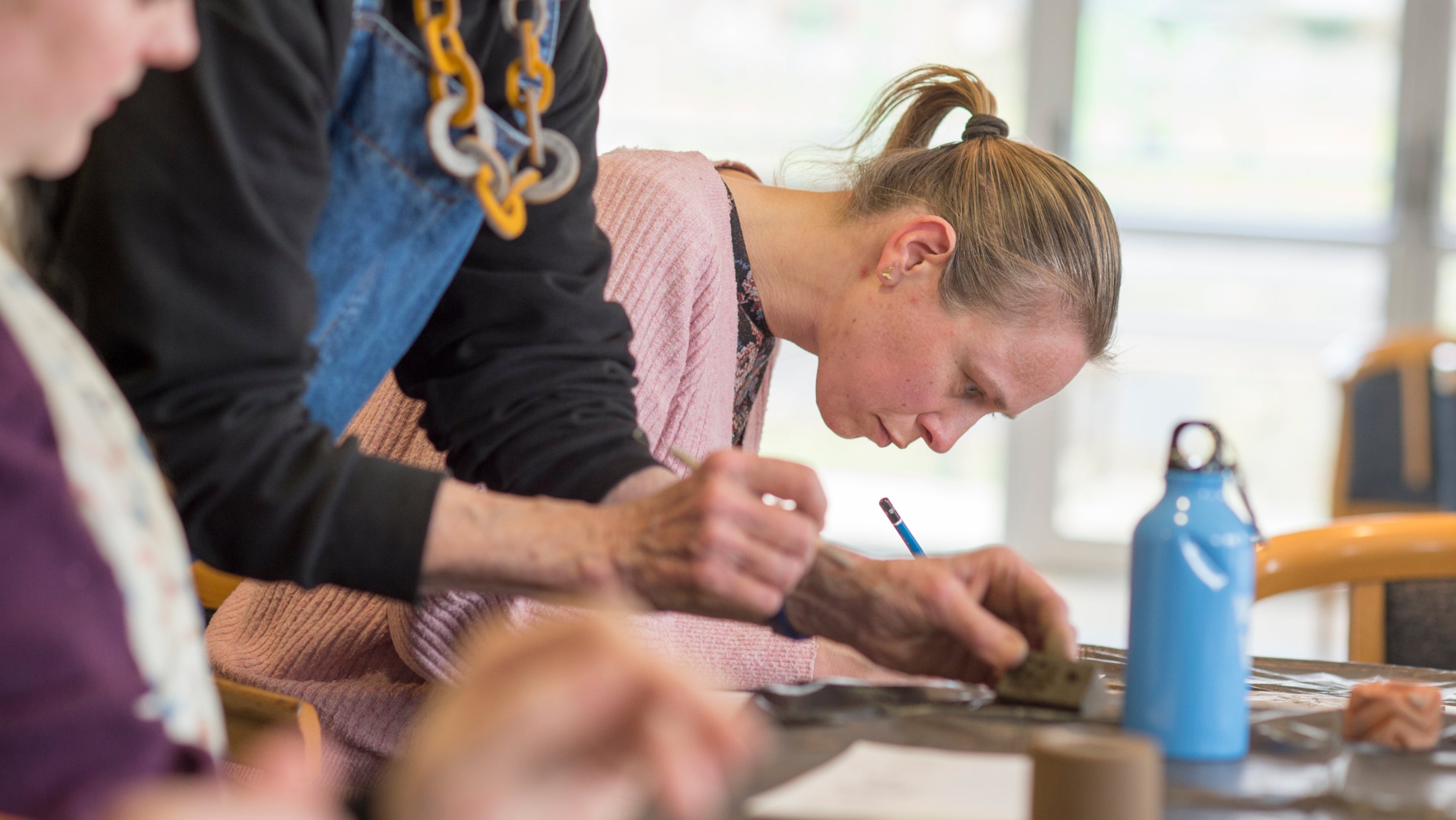 Workshop participant creating a chimney roulette design
