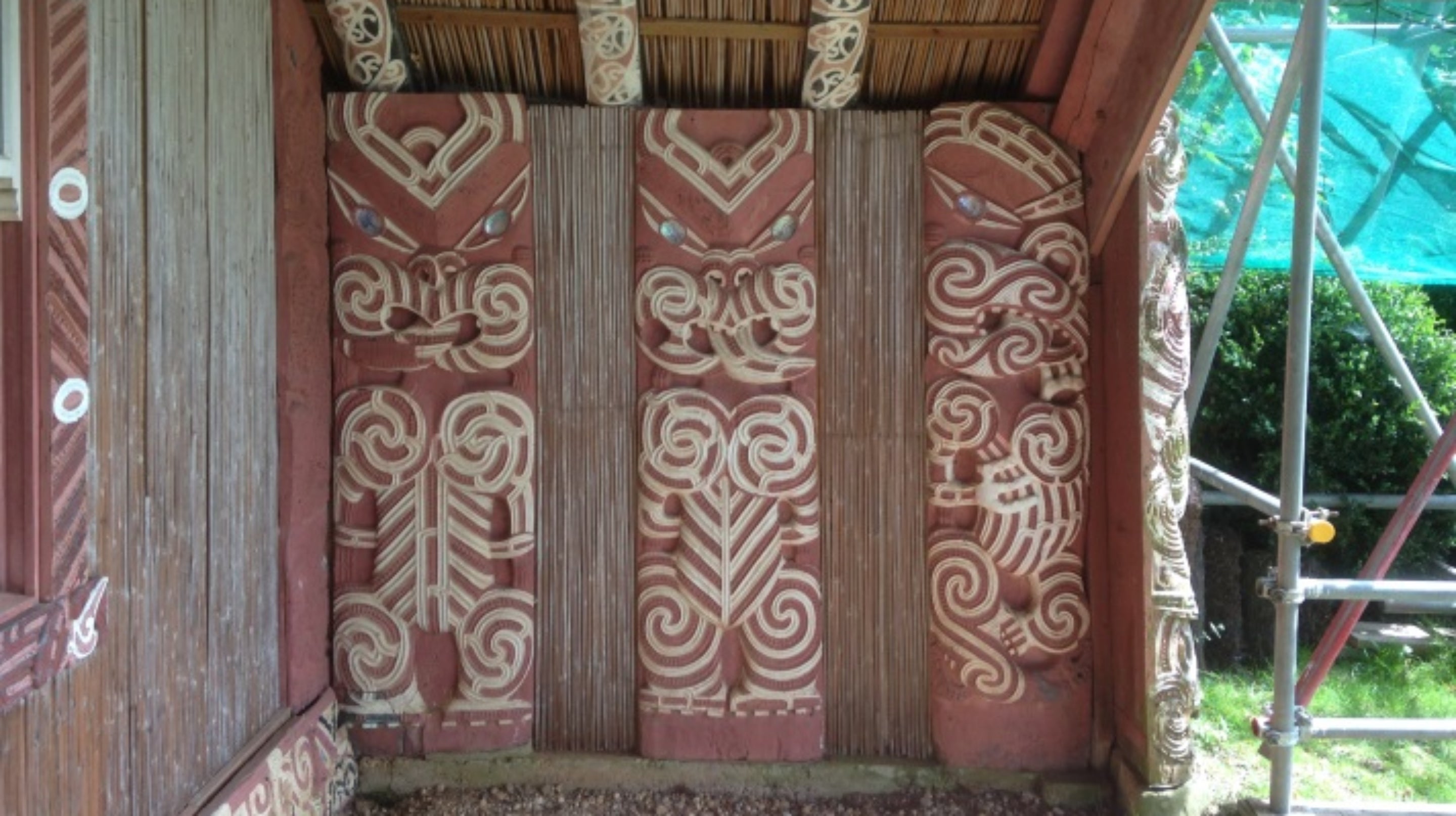 Carvings at Māori meeting house, known as Hinemihi, at Clandon Park, Surrey