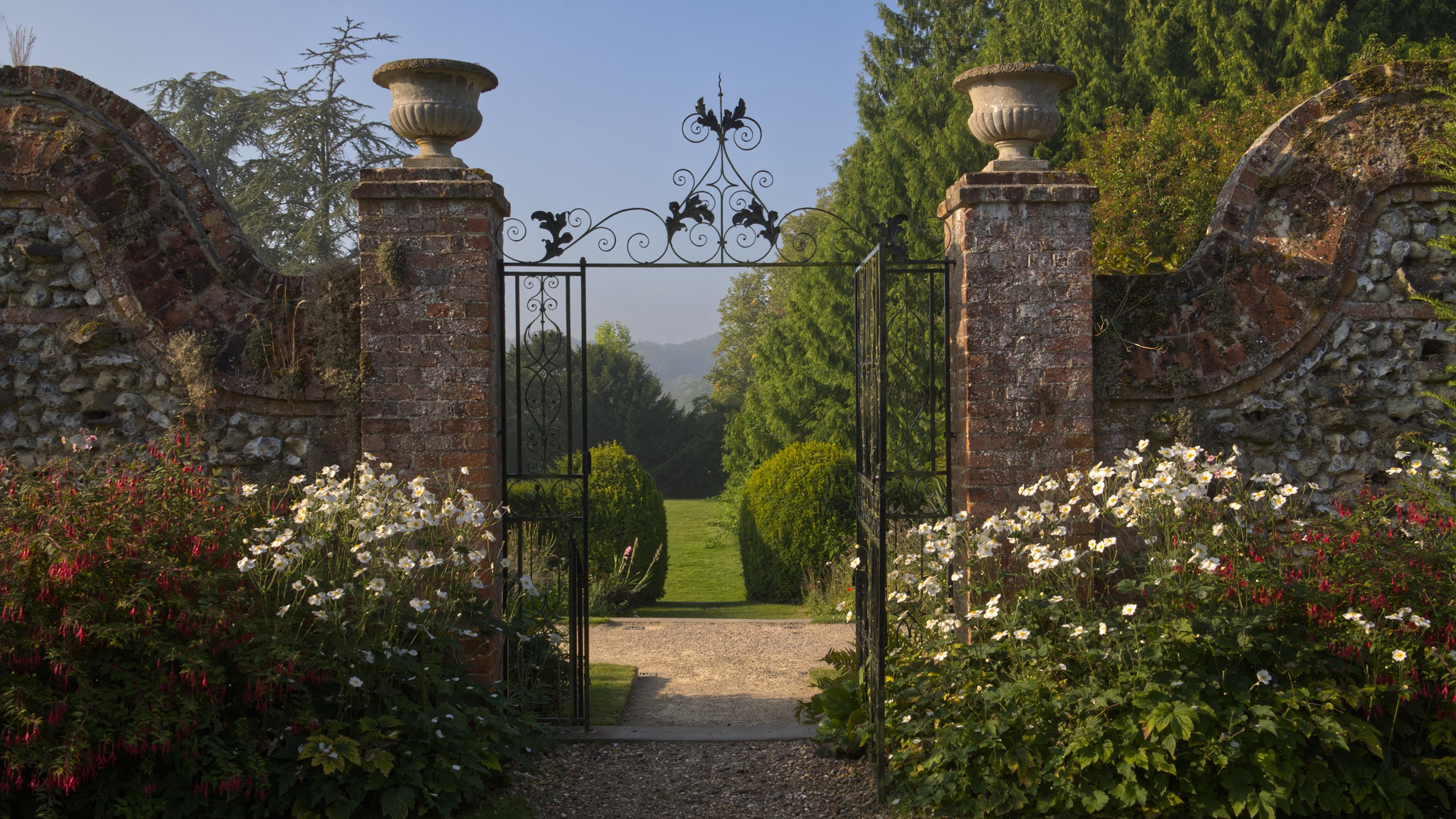 View through the garden gates at Polesden Lacey in autumn
