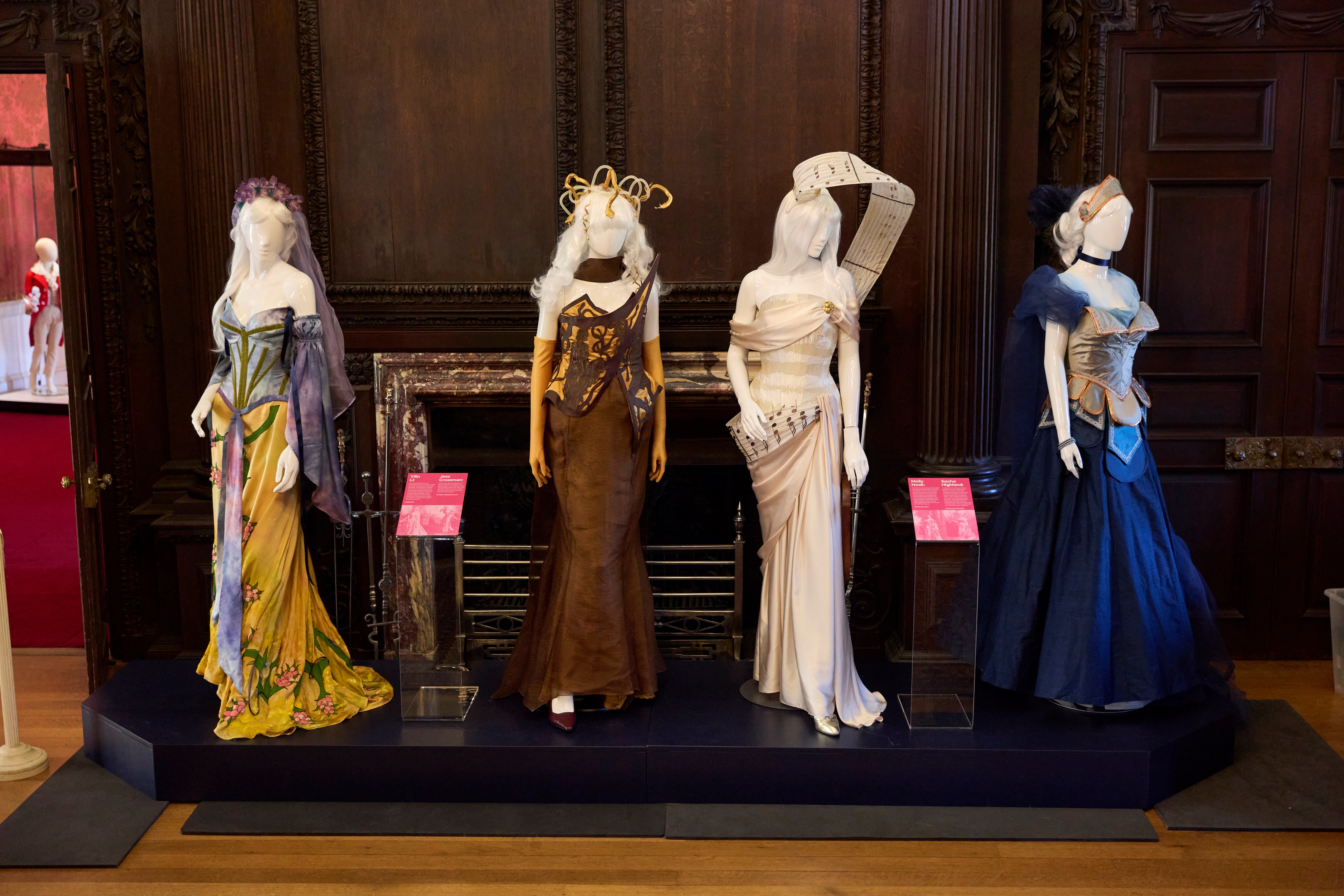Four opulent costumes designed by students of Wimbledon College of Arts (UAL) on display for the Dress to Impress exhibition at Polesden Lacey