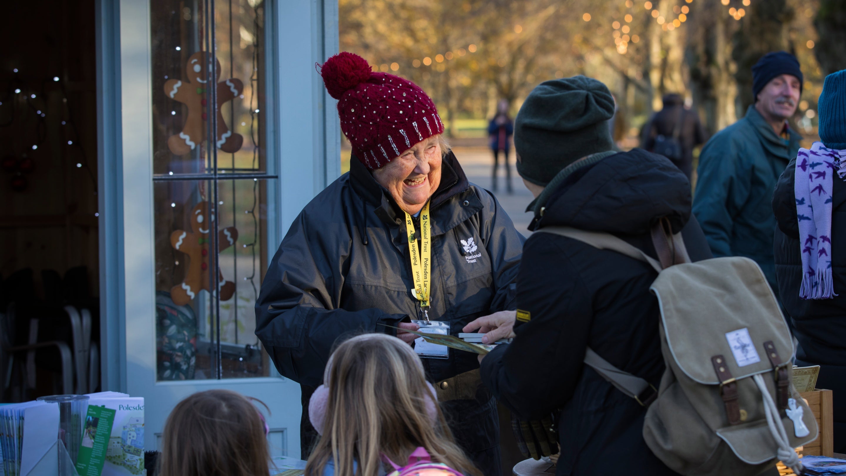 Volunteer welcoming visitors at Polesden Lacey, Surrey