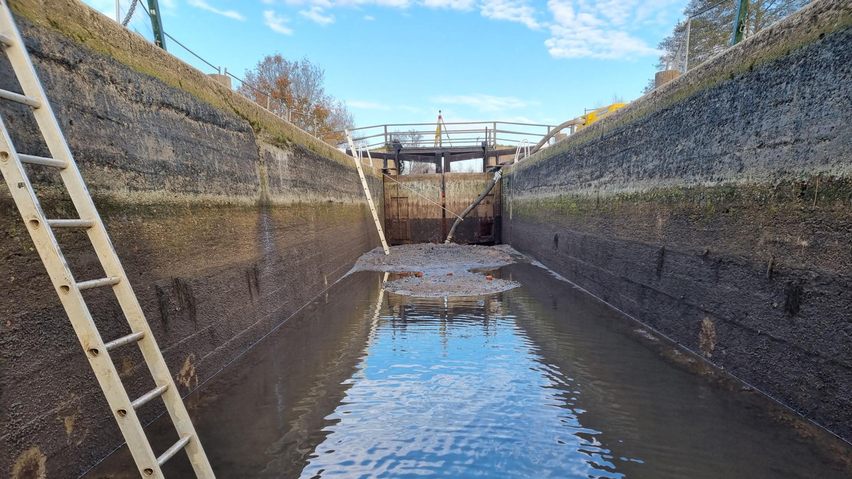 Empty lock with ladders and pumps at St Catherine’s on the River Wey, Surrey