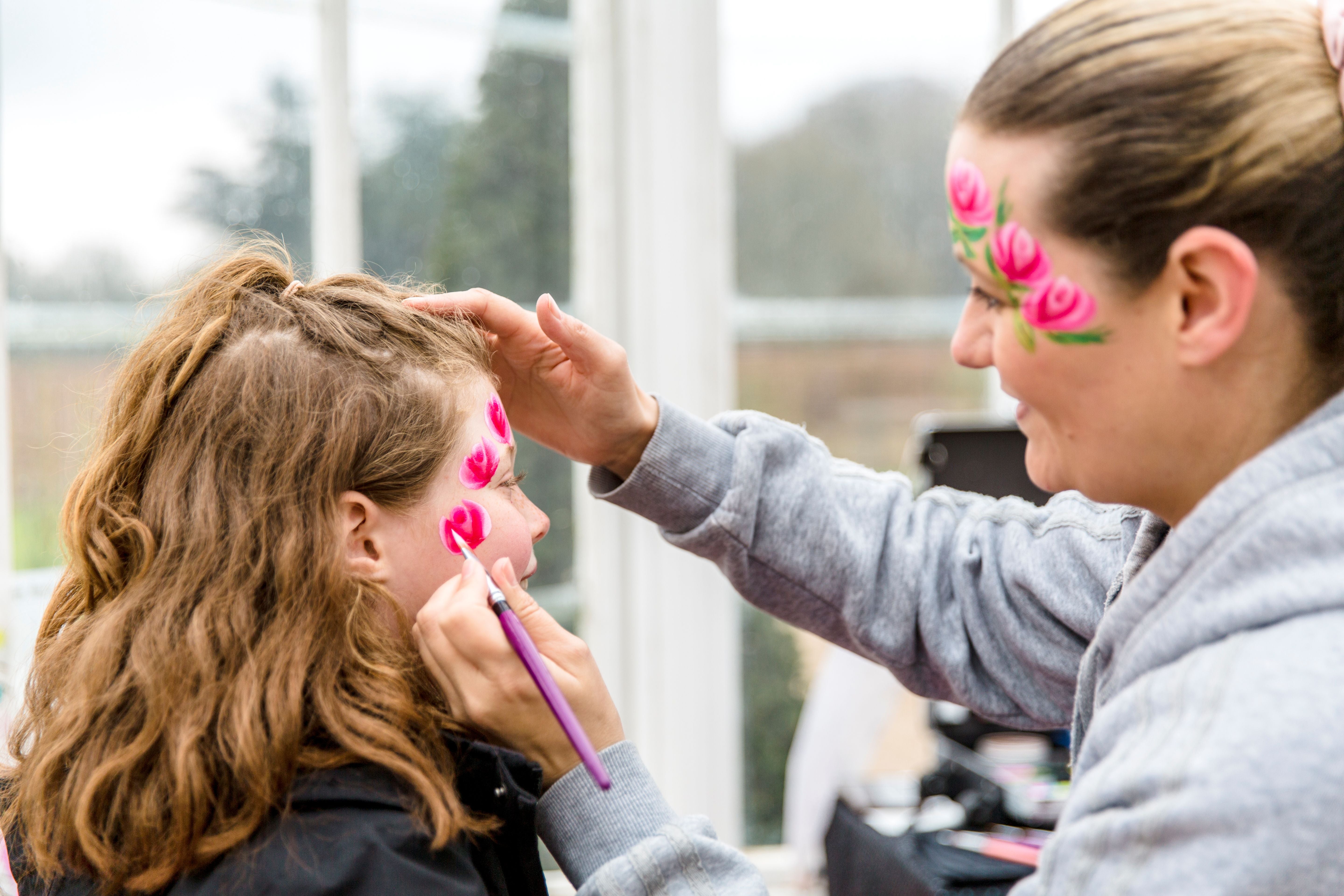 Face painting during the Festival of Blossom at Clumber Park, Nottinghamshire