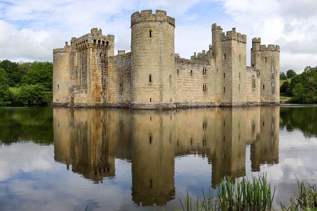 A view of Bodiam Castle with it's reflection in the moat.