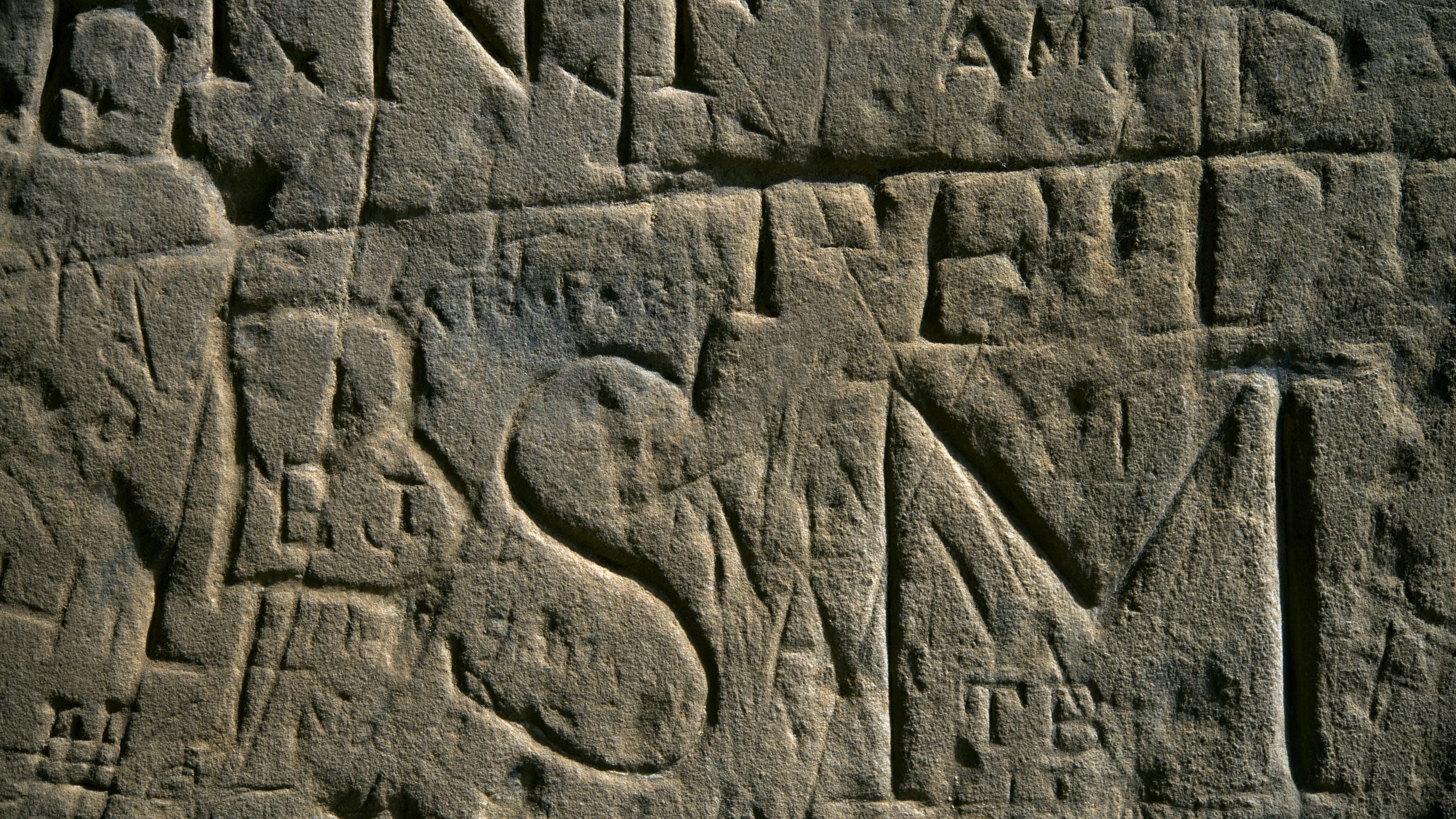 Graffiti carved into the stonework at Bodiam Castle, East Sussex